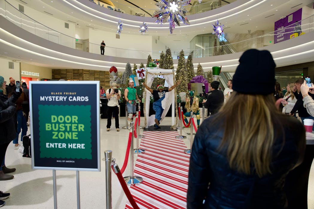 Shoppers at the Mall of America redeemed their mystery cards, given to the first 4,000 shoppers through the door on Black Friday.