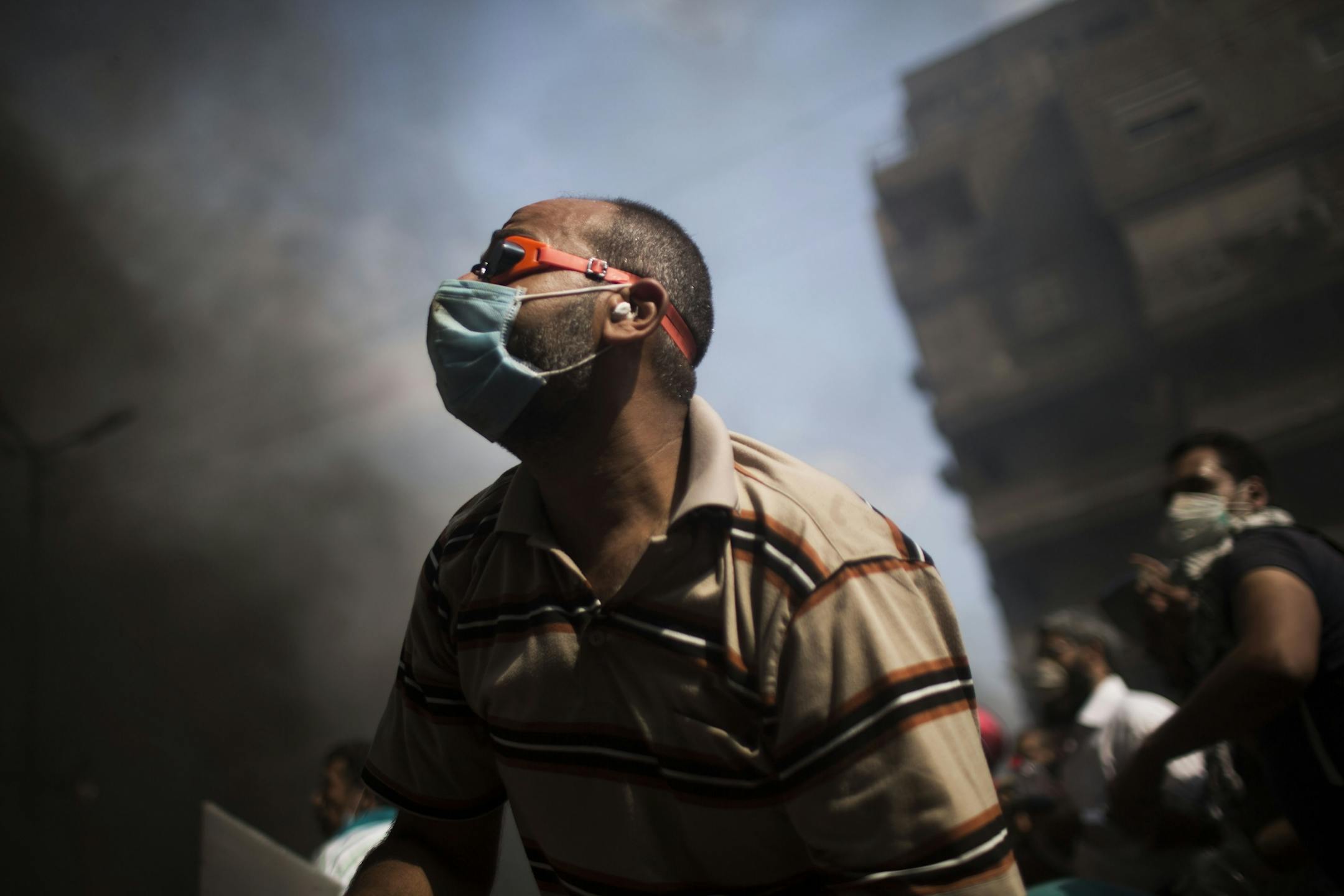 Supporters of ousted Egyptian President Mohammed Morsi clash with security forces in Cairo's Nasr City district, Egypt, Wednesday, Aug. 14, 2013.