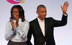 Michelle and Barack Obama arrive for the first session of the Obama Foundation Summit in Chicago in October.