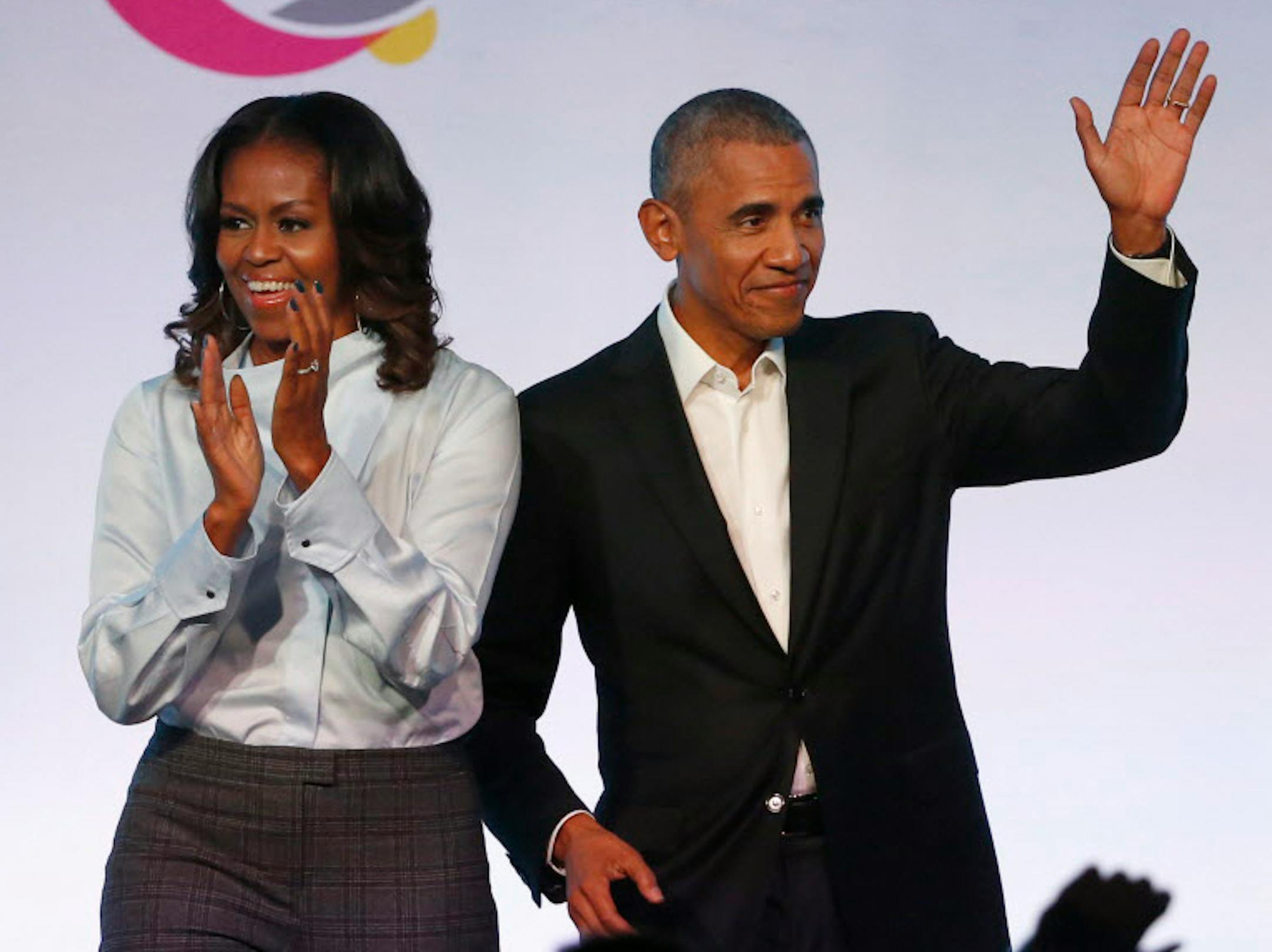 Michelle and Barack Obama arrive for the first session of the Obama Foundation Summit in Chicago in October.