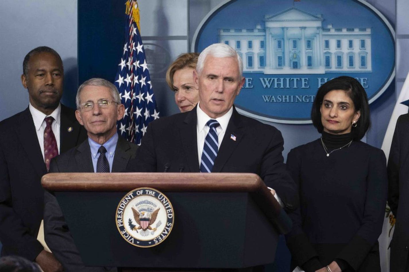 Vice President Mike Pence, accompanied by Dr. Anthony Fauci, director at the National Institute of Allergy and Infectious Diseases, left, and other health officials, addresses a news conference at the White House in Washington, Wednesday, March, 4, 2020.