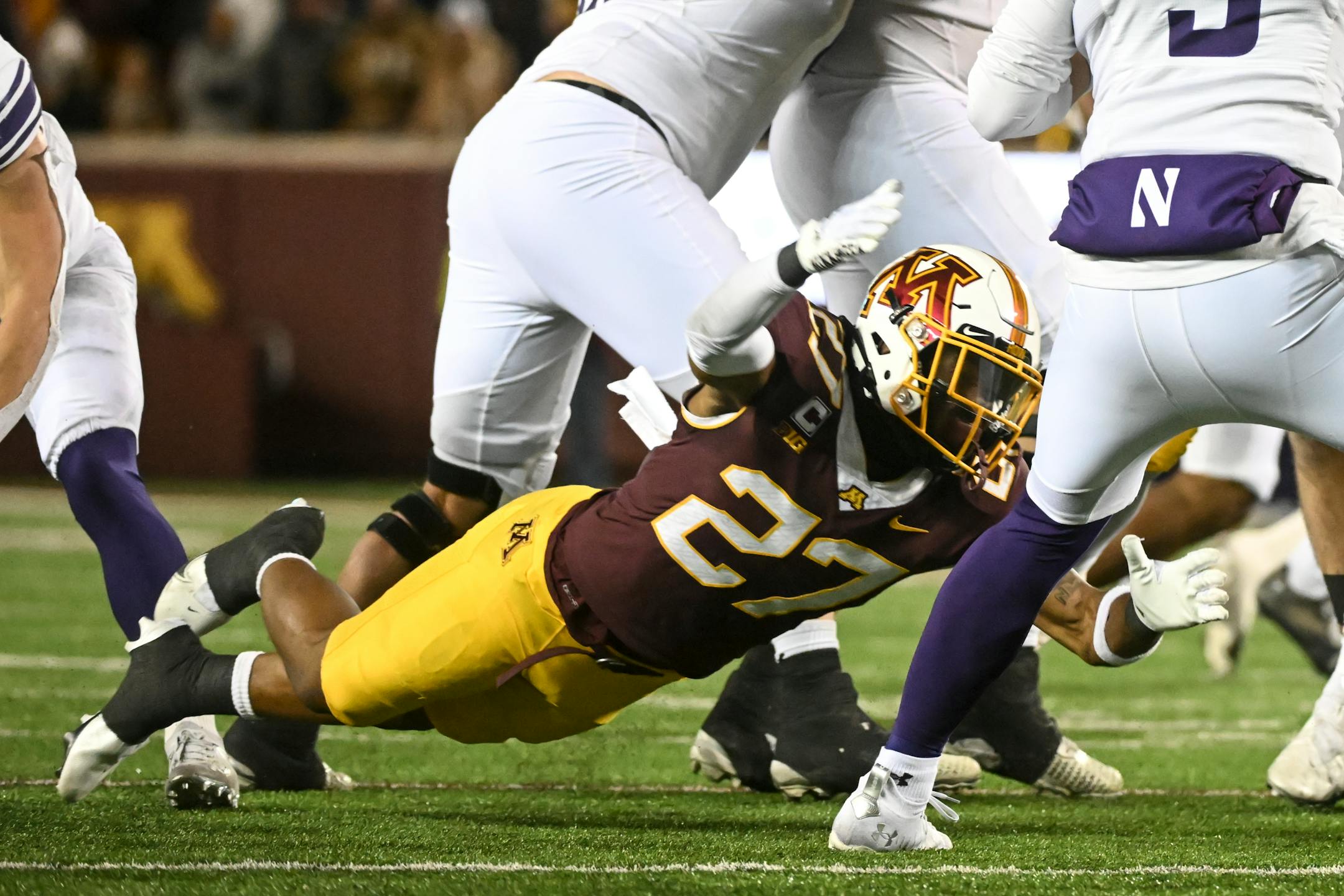Minnesota Gophers defensive back Tyler Nubin (27) was called for a penalty for a low tackle against Northwestern Wildcats quarterback Ryan Hilinski (3) during the second half.