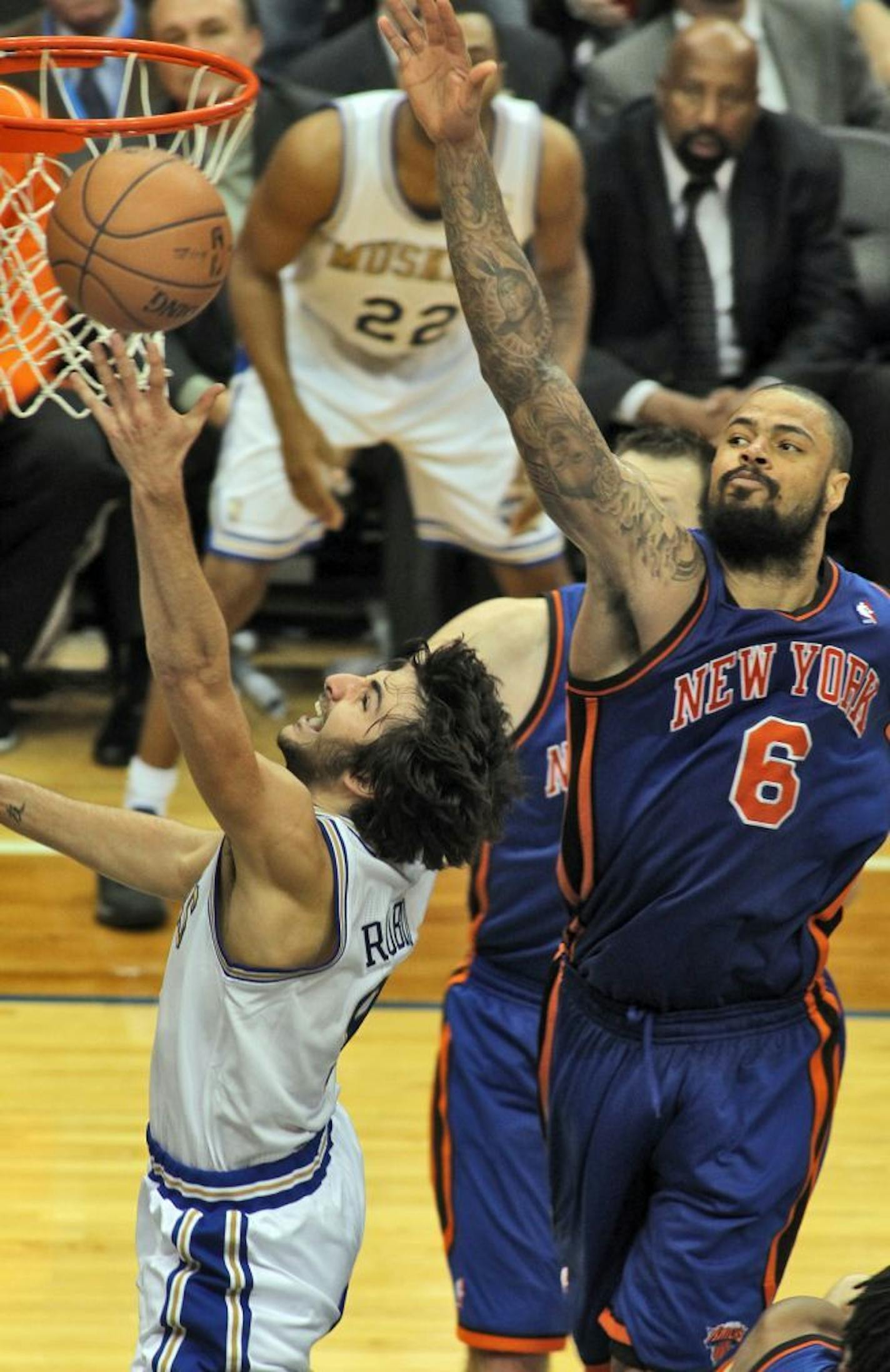 Wolves point guard Ricky Rubio drove past the defense of the Knicks' Tyson Chandler for a layup, putting the Wolves ahead late in the game Friday, but New York rallied to win 100-98.