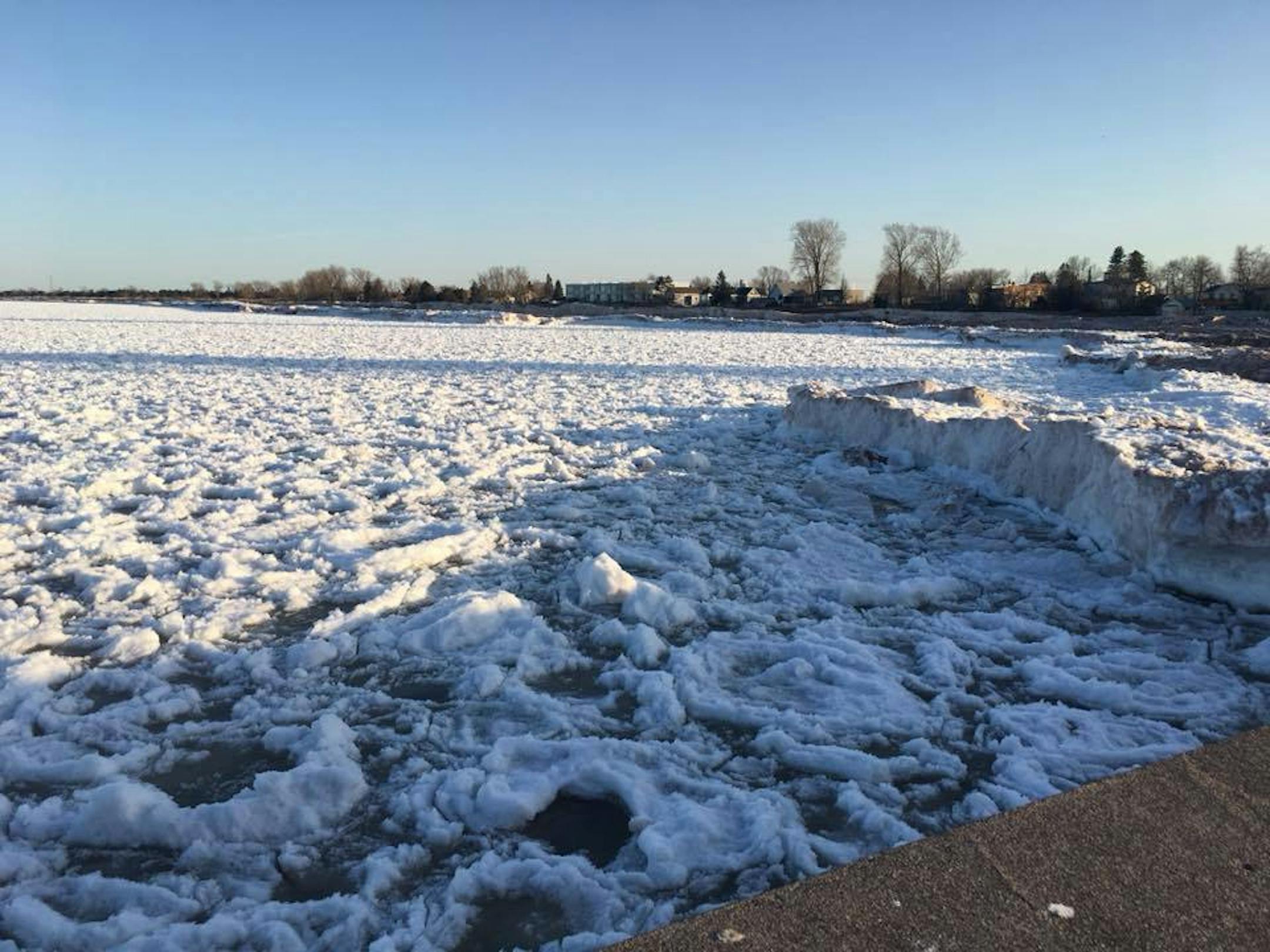 Duluth Police Department photo: Ice still lines the beach at Park Point in Duluth. On Saturday, several people had to be rescued when they fell through it. ORG XMIT: C1Ud7FkZELw702RqKxfd
