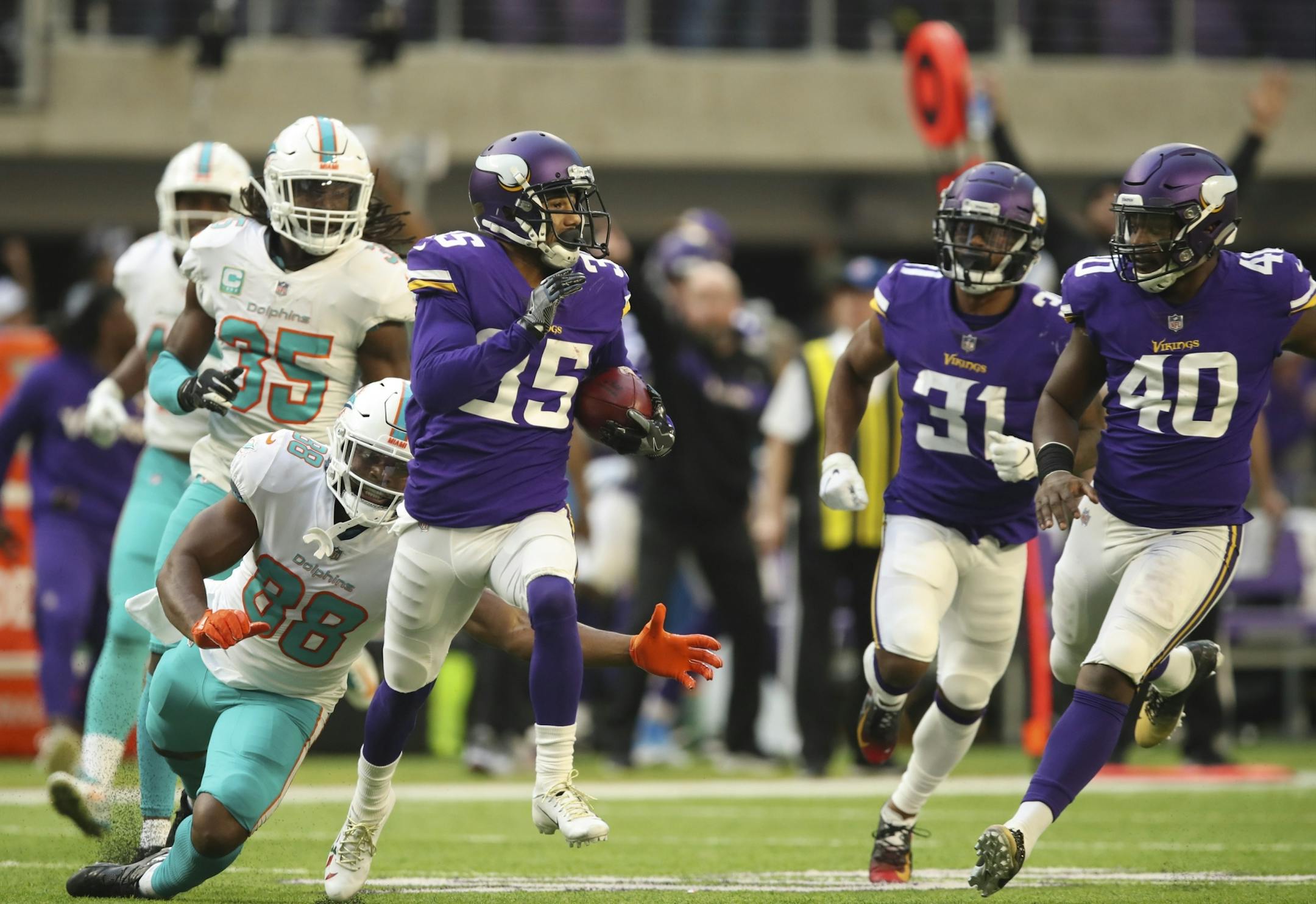 Minnesota Vikings defensive back Marcus Sherels (35) returned a third quarter punt for 70 yards before being tripped up by Miami Dolphins wide receiver Leonte Carroo (88).