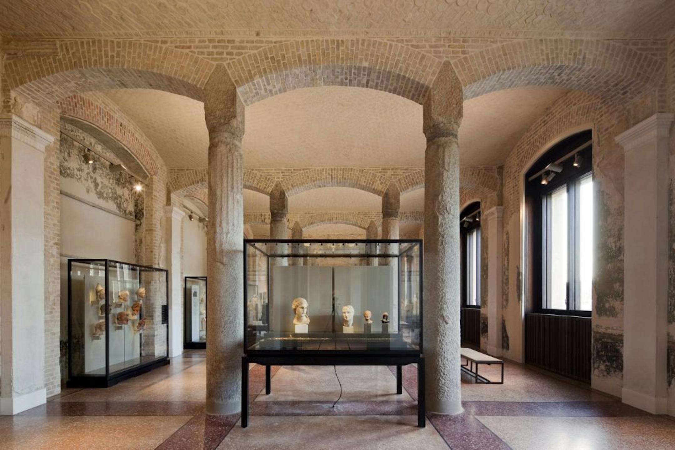 This gallery in the Neues Museum, with weathered columns and vestiges of shell-torn holes, is called "Cyprus, Island of Aphrodite."