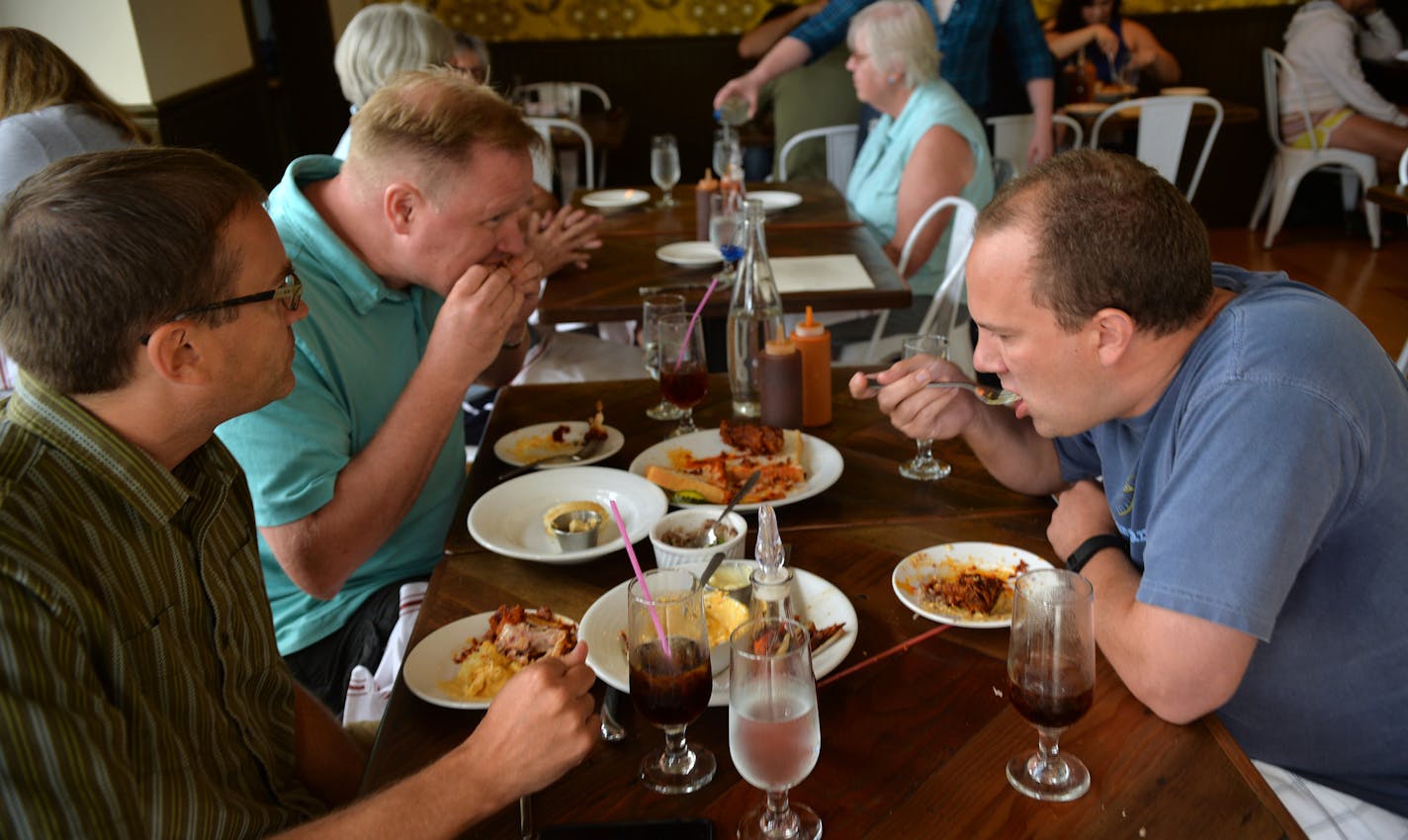 From left:&#x2009; Mike Klemm of Minnetonka, Mark Bakke and Marc Olin of Edina share lunch in a packed dining room at Revival in Minneapolis. &#x201c;We have so many Southerners who come up to me every day and say, &#x2018;This is the food that I grew up with,&#x2019;&#x2009;&#x201d; said chef/co-owner Thomas Boemer.