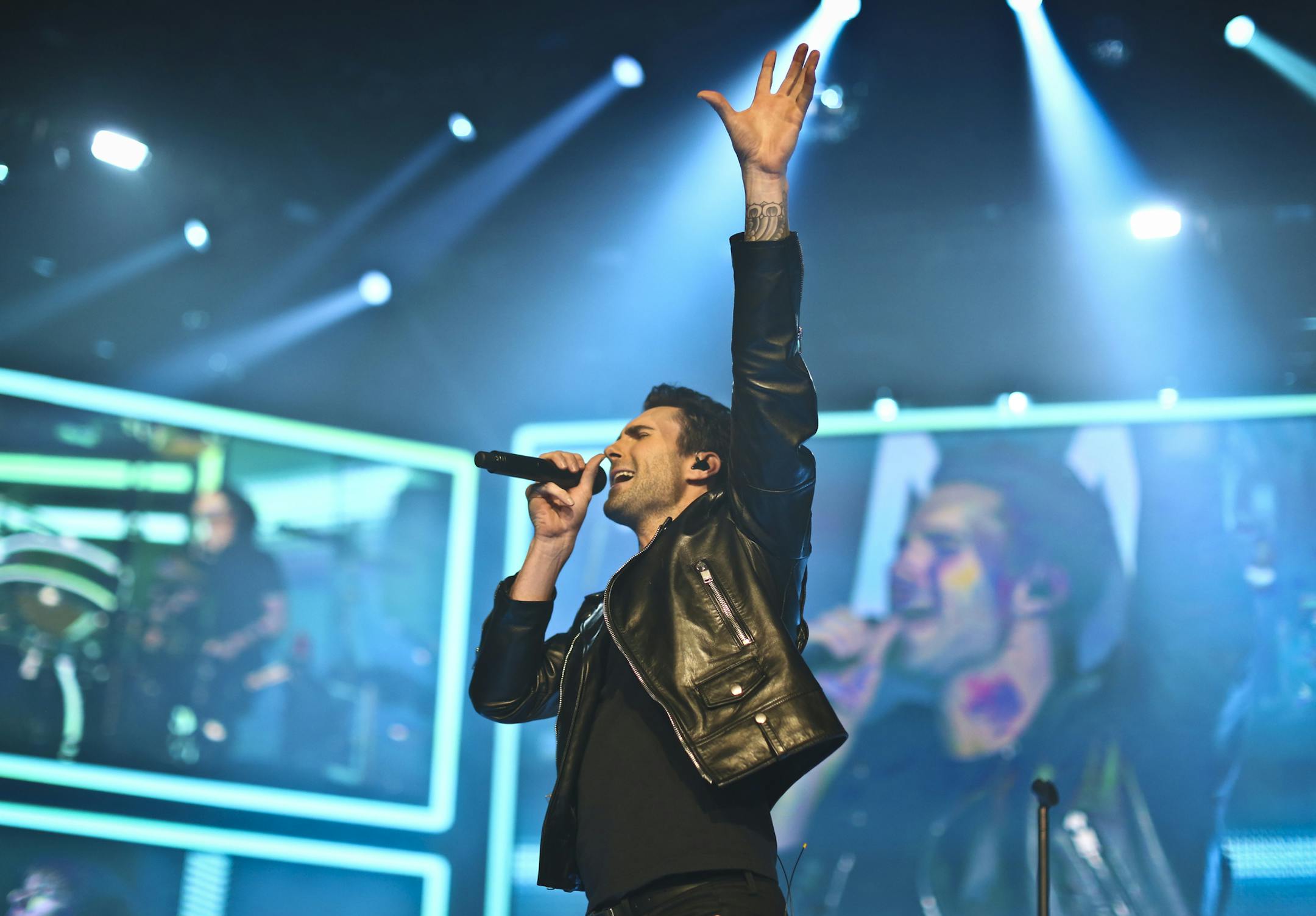 Adam Levine of Maroon 5 worked all parts of the Xcel Energy Center stage Monday evening in a sold-out performance. He acted like a rock star and even danced a bit.
