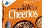 General Mills will add chocolate peanut butter Cheerios to its permanent lineup of flavors for its flagship cereal next month. The company now has 15 