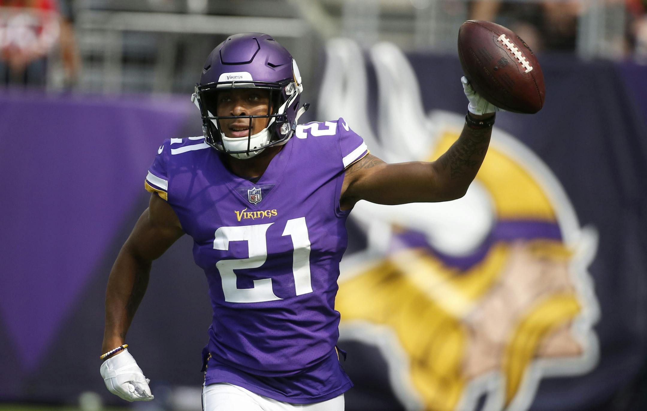 FILE - In this Sept. 9, 2018, file photo, Minnesota Vikings cornerback Mike Hughes celebrates after returning an interception 28-yards for a touchdown during the second half of an NFL football game against the San Francisco 49ers, in Minneapolis. Hughes was forced into a heavy role in his NFL debut by injuries in Minnesota's secondary, and this week the rookie has been preparing to face Green Bay quarterback Aaron Rodgers. There's no easing in for this first-round draft pick. (AP Photo/Bruce Klu