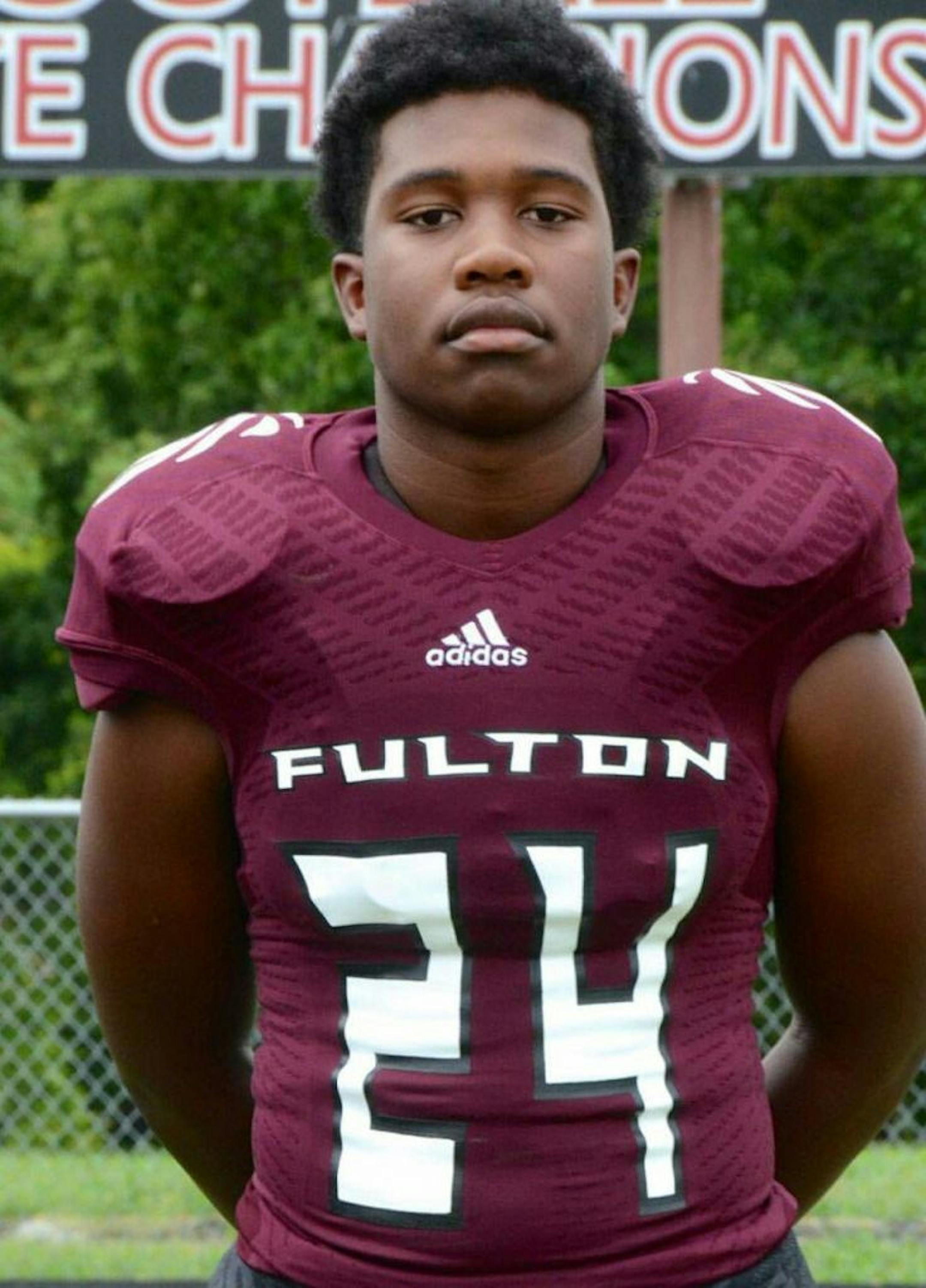 This undated photo released by the Knox County Schools, high school football player Zaevion Dobson, 15, was shot to death Thursday night, Dec. 17, 2015, in Knoxville, Tenn., as he shielded three girls from gunfire in a shooting spree. Dobson, a sophomore at Fulton High School in northern Knoxville, was �a fine, fine young man,� said Fulton High School football coach Rob Black.