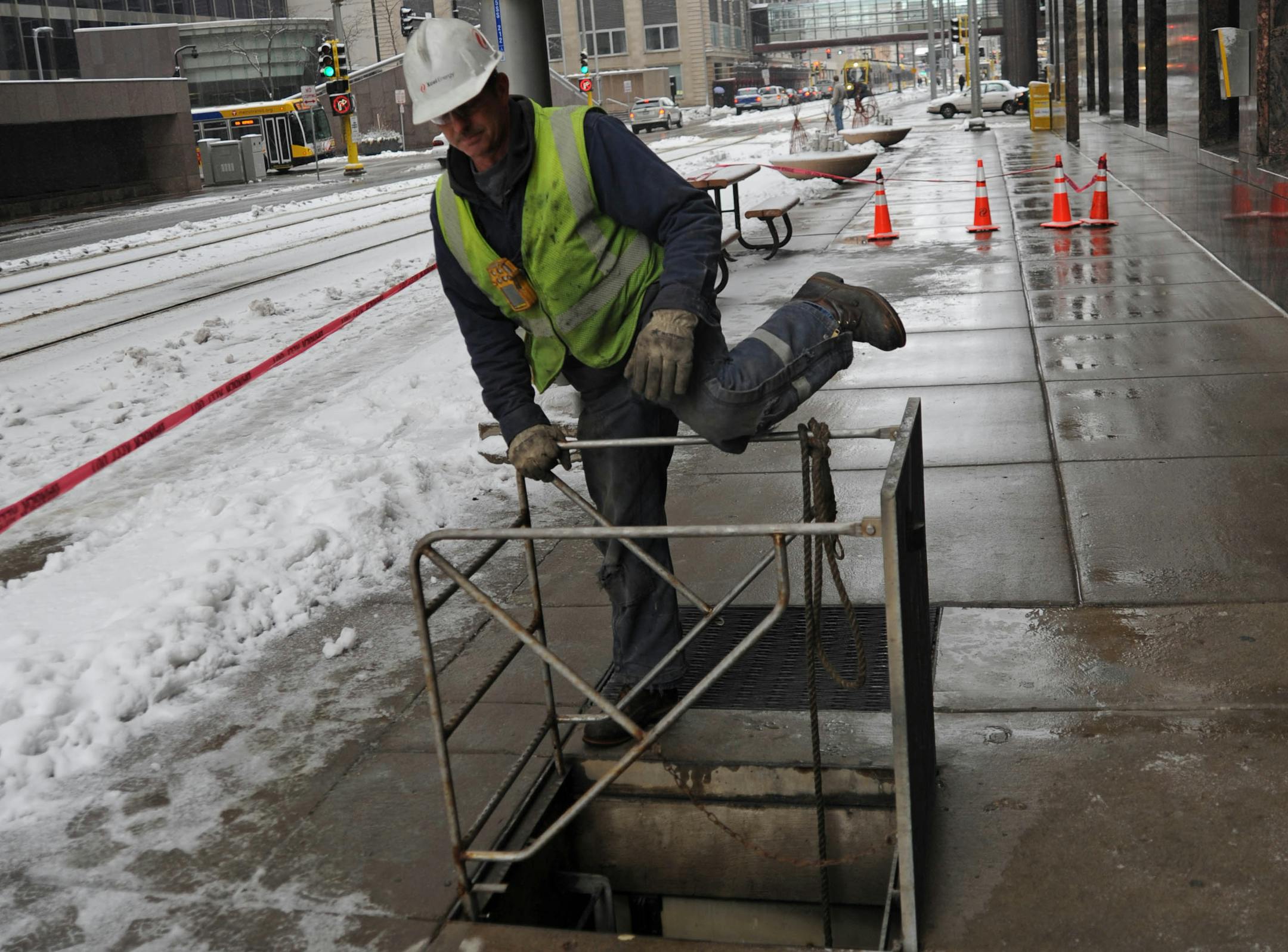 Part of downtown Minneapolis was without power, Tom Hunn, with Xcel worked on the site of the transformer fire on 5th St. Electricity was out for more than 90 minutes Friday morning in several blocks of downtown Minneapolis, darkening City Hall and police headquarters, officials said.