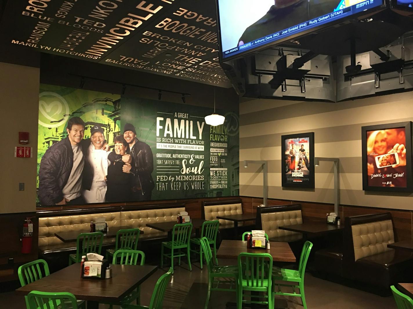 The interior of Wahlburger's at the Mall of America is decorated with posters of the celebrity family that started the Boston-based burger chain. Hy-Vee is in a venture with the Wahlberg brothers to expand the chain in the Midwest.