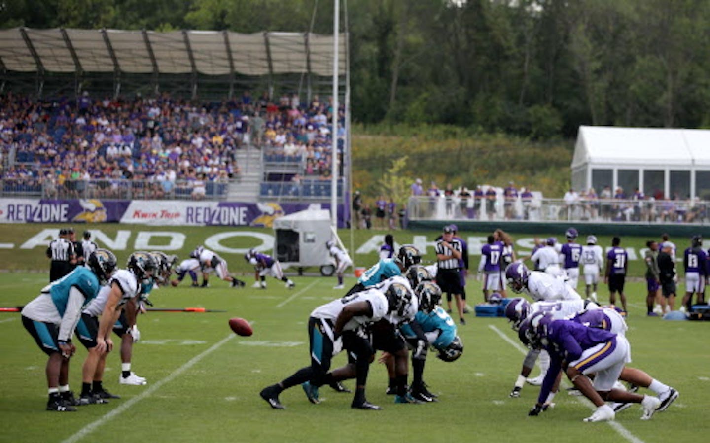 The Minnesota Vikings and the Jacksonville Jaguars share a joint practice session as fans look on Thursday, Aug. 16, 2018, at the TCO Performance Center in Eagan, MN.]