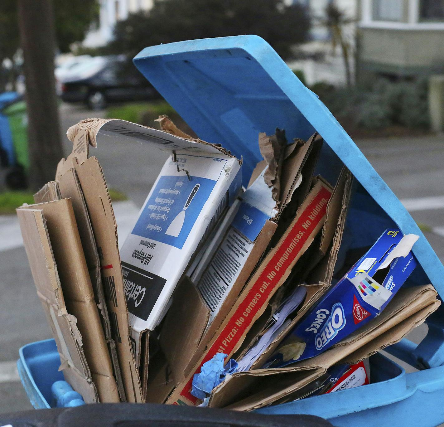 Cardboard overflows from a recycling bin in San Francisco, Jan. 28, 2016. Delivery services now come through in hours, not days. But the boxes after boxes generated are creating environmental concerns, and some guilt. (Jim Wilson/The New York TImes) ORG XMIT: MIN2016042812294708