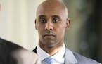 In this Friday, April 26, 2019, photo, former Minneapolis police officer Mohamed Noor walks to court in Minneapolis.