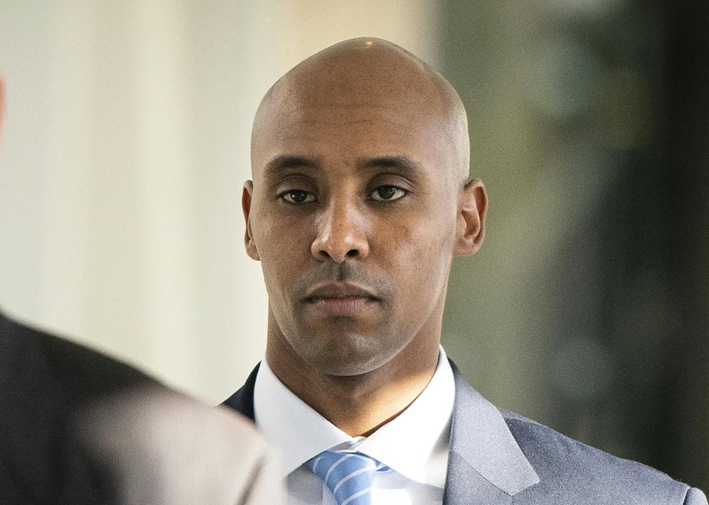 In this Friday, April 26, 2019, photo, former Minneapolis police officer Mohamed Noor walks to court in Minneapolis.