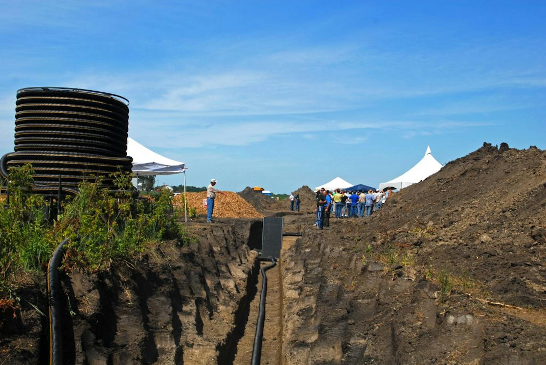 West of Granite Falls on Wednesday a demonstration conservation drainage system was laid bare on a farm bordering the Yellow Medicine River. The system is designed to remove nitrates from farmland runoff before it enters the river.