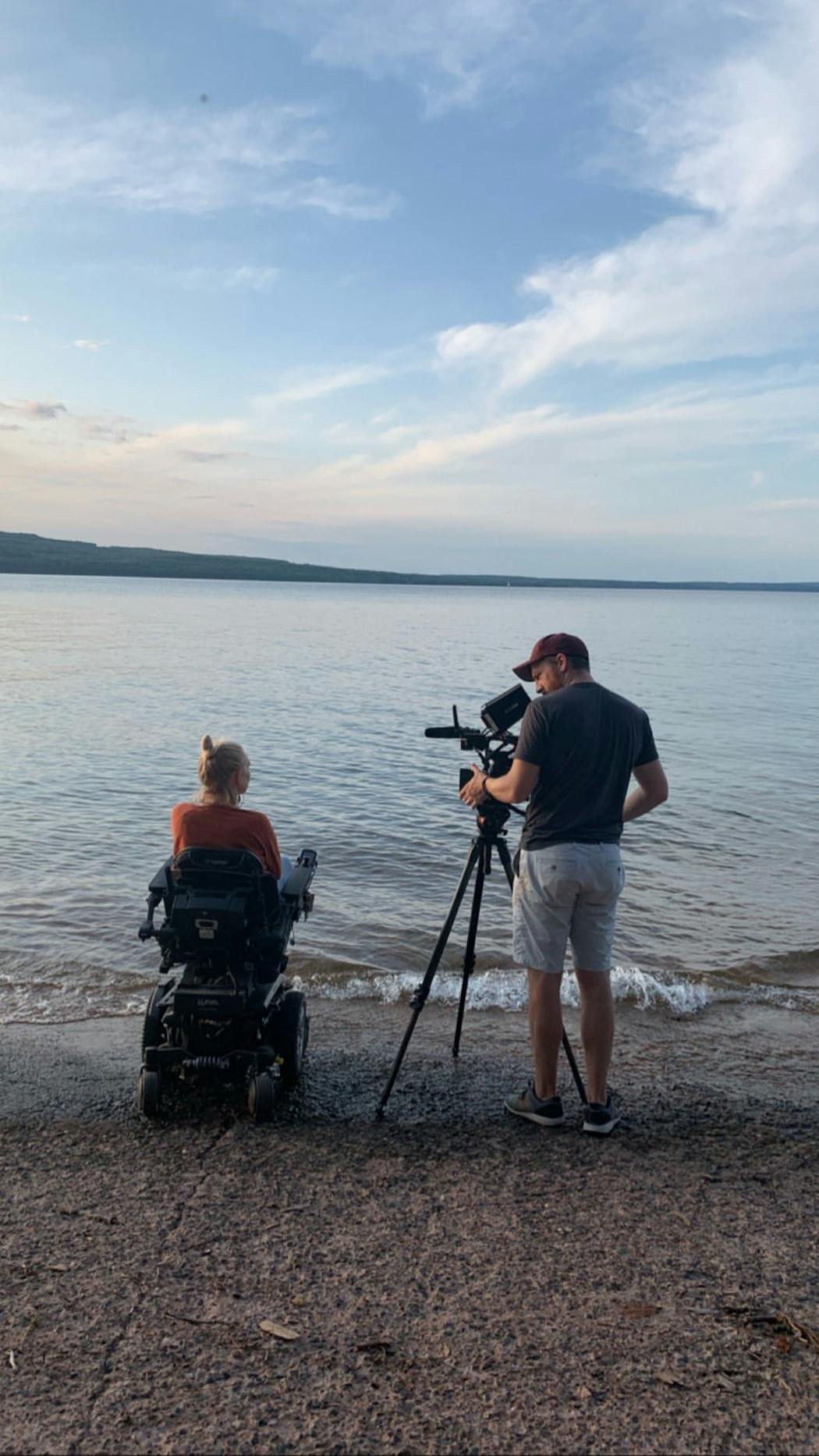 Director Kelsey Peterson and Brennan Vance, director of photography, filming on Madeline Island for the documentary “Move Me”