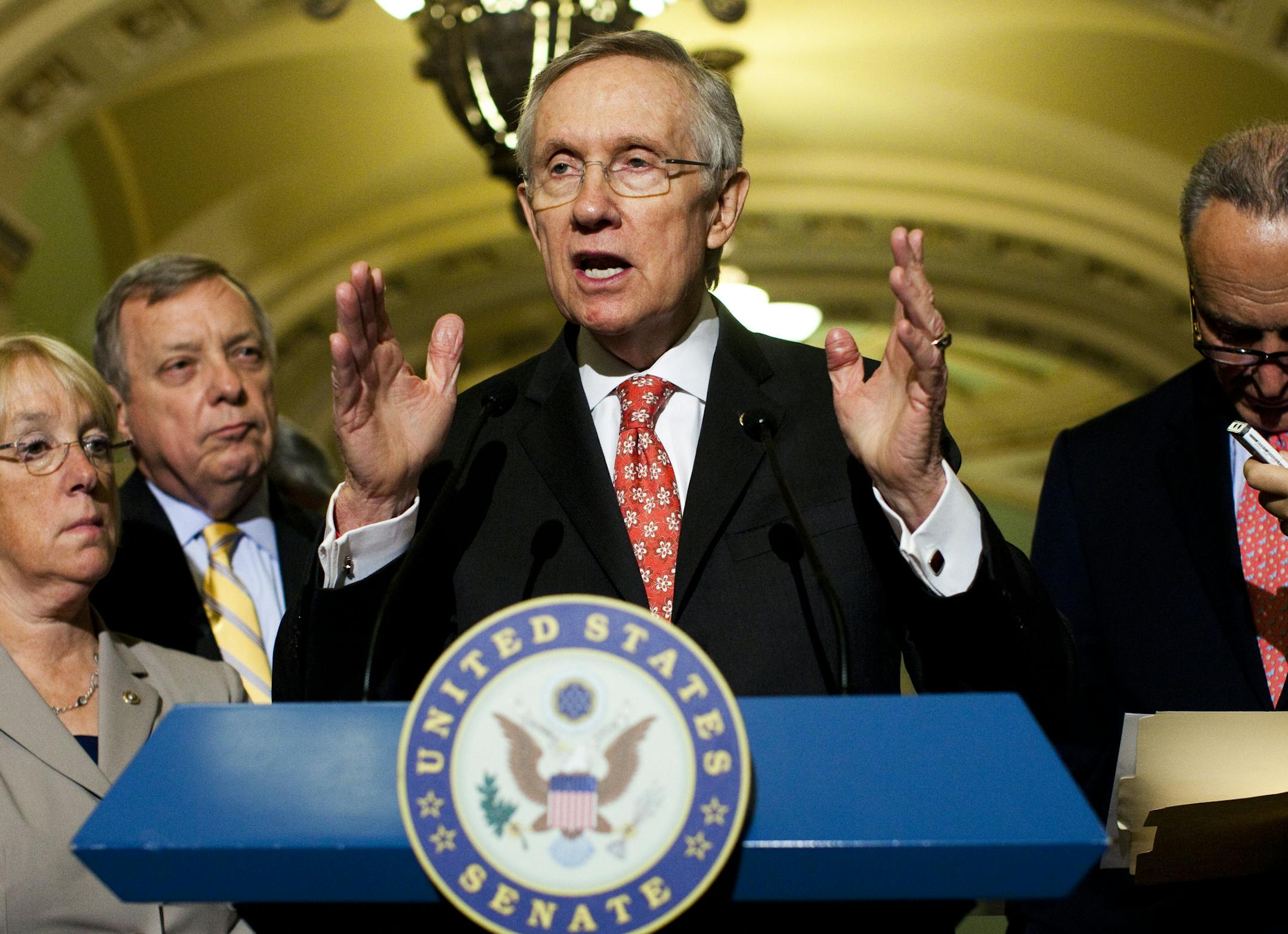 Sen. Harry Reid (D-Nev.) speaks during a news conference on Capitol Hill in Washington, July 11, 2013. A confrontation in the Senate between Republicans and Democrats over the confirmation of President Barack Obama&#x2019;s cabinet nominees edged closer on Thursday toward a showdown over changing the rules on filibusters. From left: Sens. Patty Murray (D-Wash.), Dick Durbin (D-Ill.), Reid and Chuck Schumer (D-N.Y.). (Christopher Gregory/The New York Times)