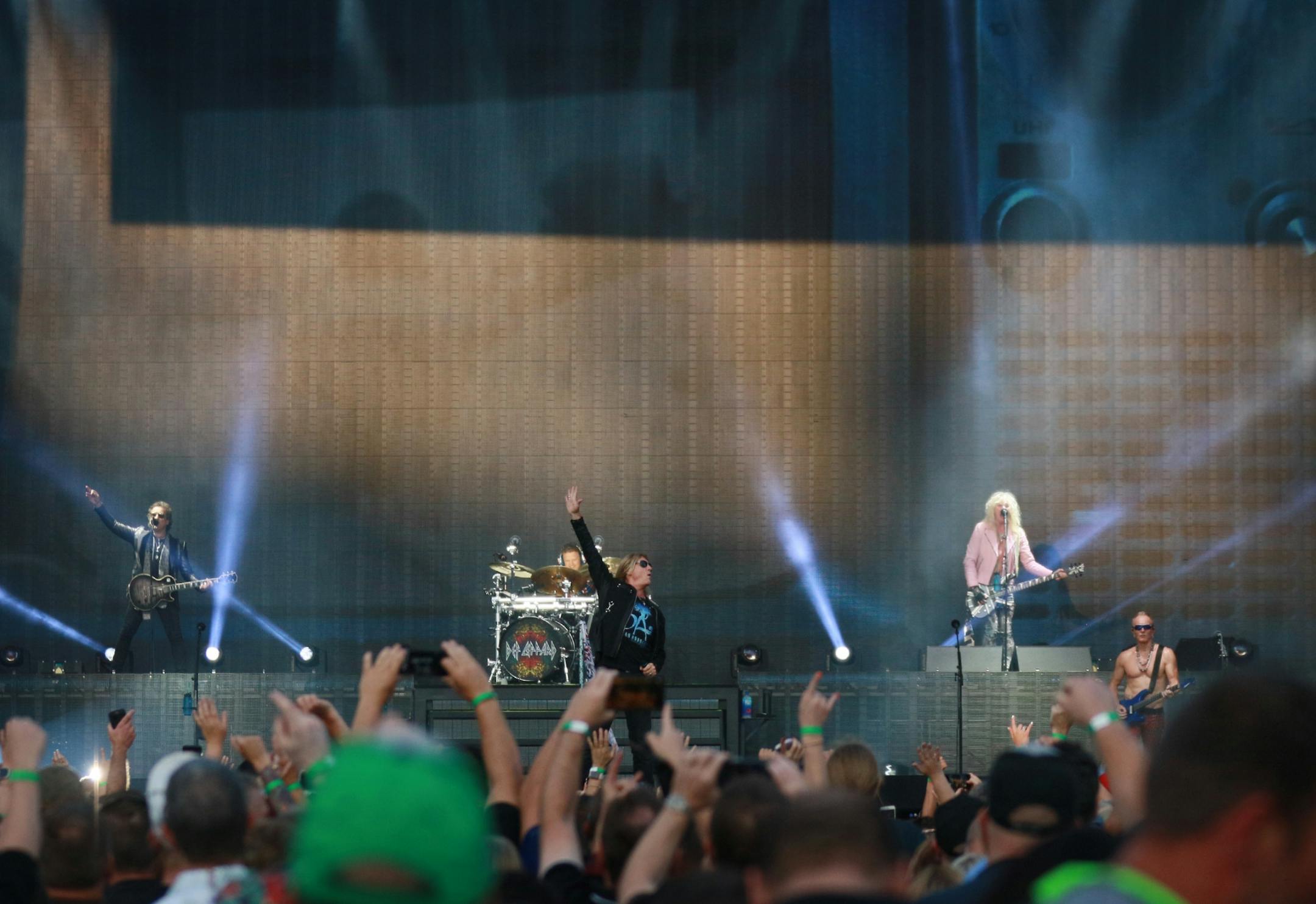Def Leppard, including Joe Elliot, lead vocals, Rick Allen drums and Rick Savage on bass guitar, performed Friday, July 27, 2018, at Target Field in Minneapolis, MN.