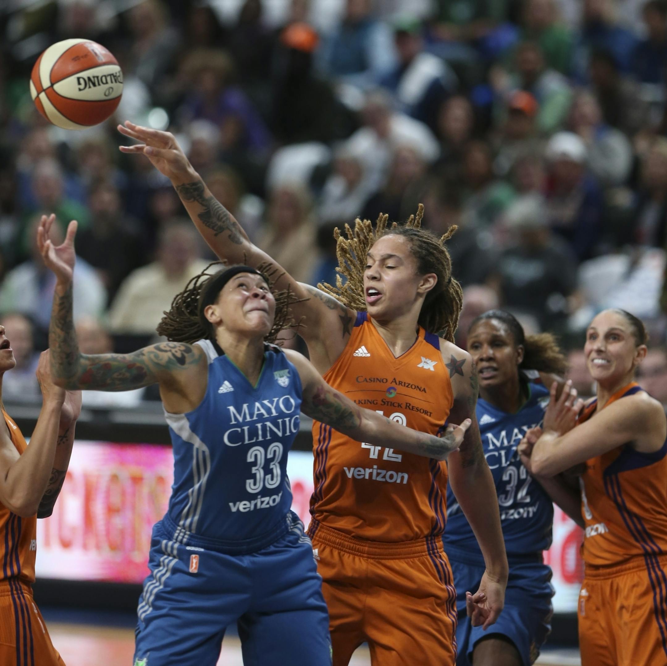 Minnesota Lynx guard Seimone Augustus (33) had her shot blocked by Phoenix Mercury center Brittney Griner (42) in the second quarter.