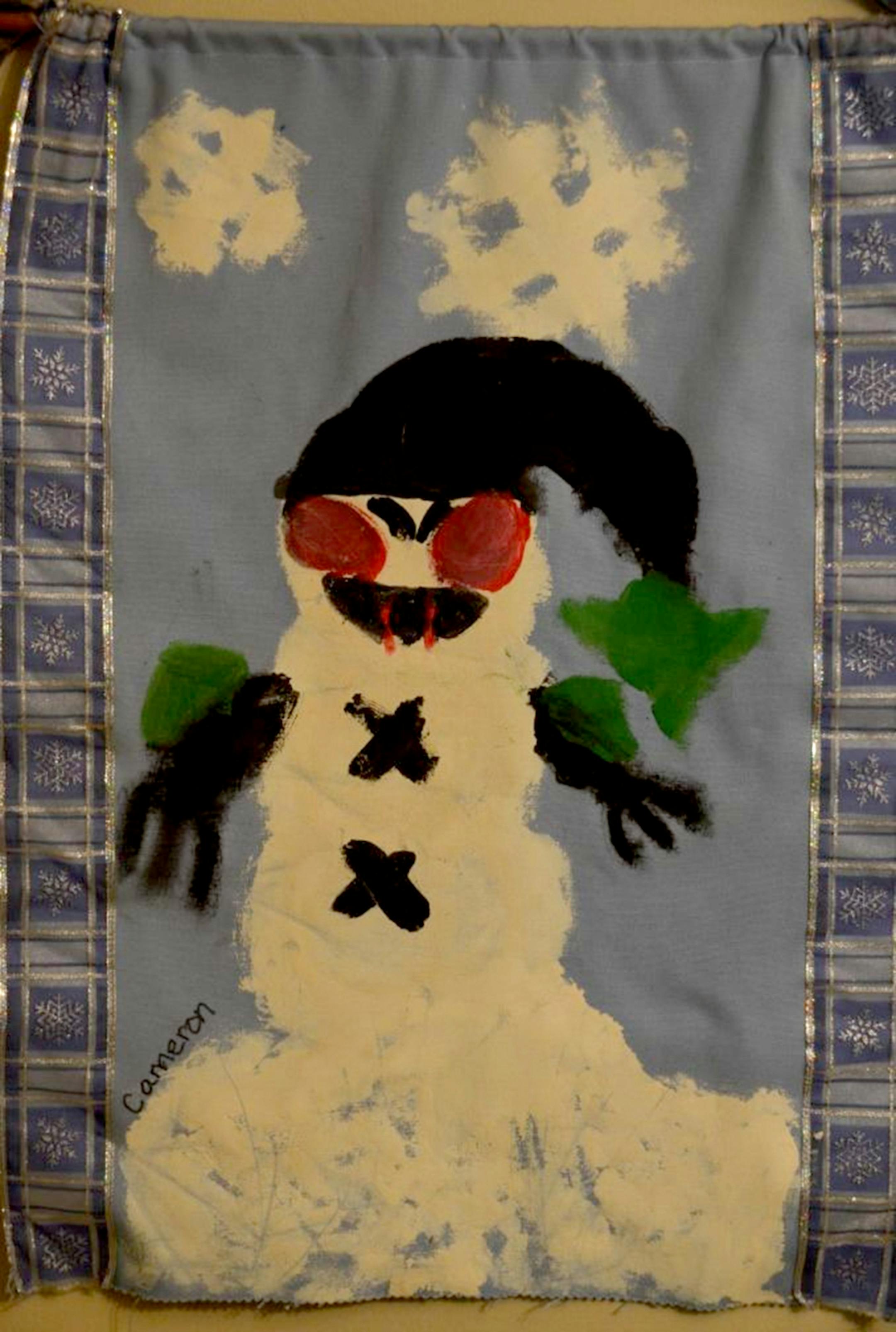 Carolyn Cleveland's "Vampire Snowman" banner, made by her son, Cameron 11 years ago. His teacher told him his mother would never hang the bloody-fanged creation in the house -- "but Cameron knew me better than that," said Cleveland, who displays it every year.