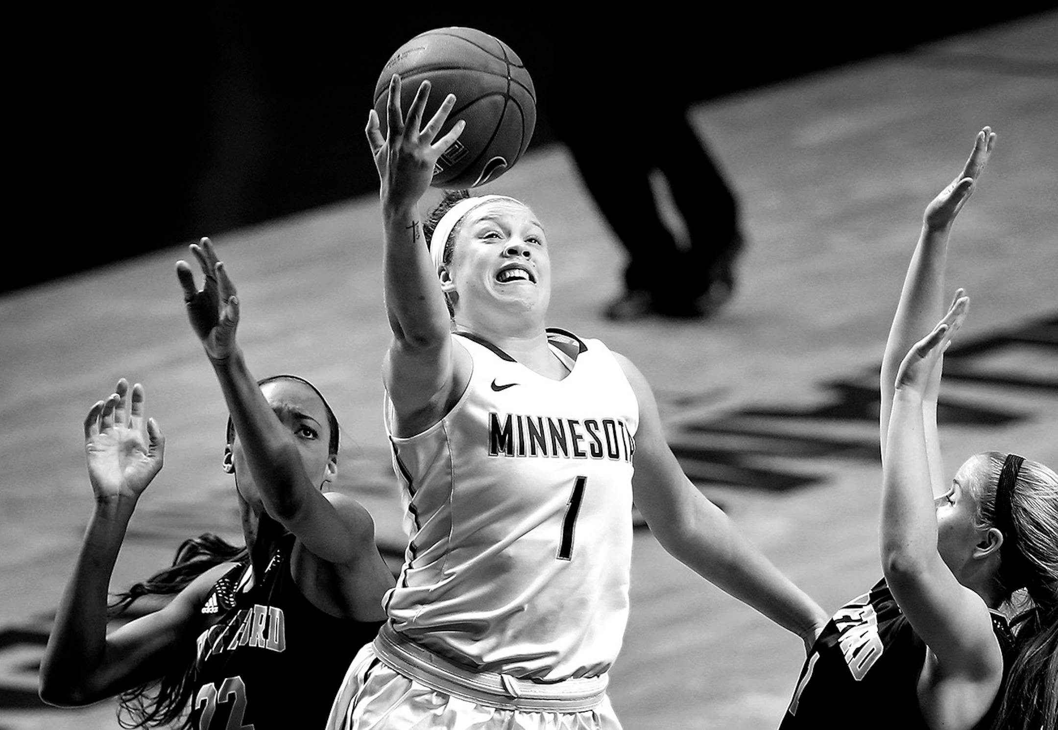 Rachel Banham attempted shot during the first game of the season vs. Wofford on November 13, 2015. Banham scored 22-points in the Gophers victory. The game was the first for Banham after her season ending injury, which occurred December of 2014. Although the injury happened during her senior year Banham received a medical hardship waiver to return for 2015-16 season. At the beginning of the season Banham needed 107 points to break the school's scoring record held by Gophers great Lindsay Whalen.