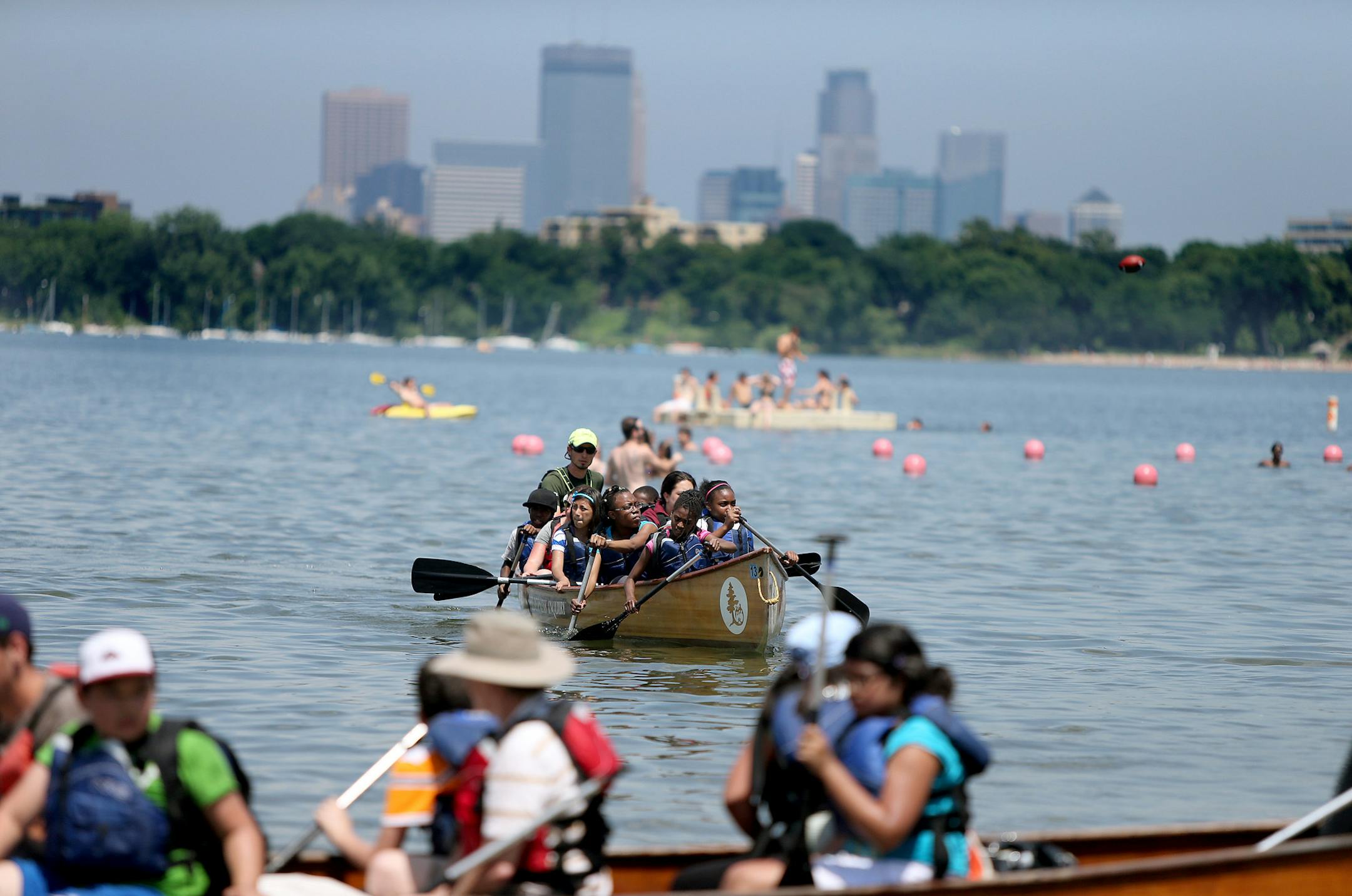 Lake Calhoun visitors kept cool in the lake by swimming, canoeing, and lounging as the air hovered over Minneapolis, Monday, July 8, 2013. (ELIZABETH FLORES/STAR TRIBUNE) ELIZABETH FLORES &#x2022; eflores@startribune.com