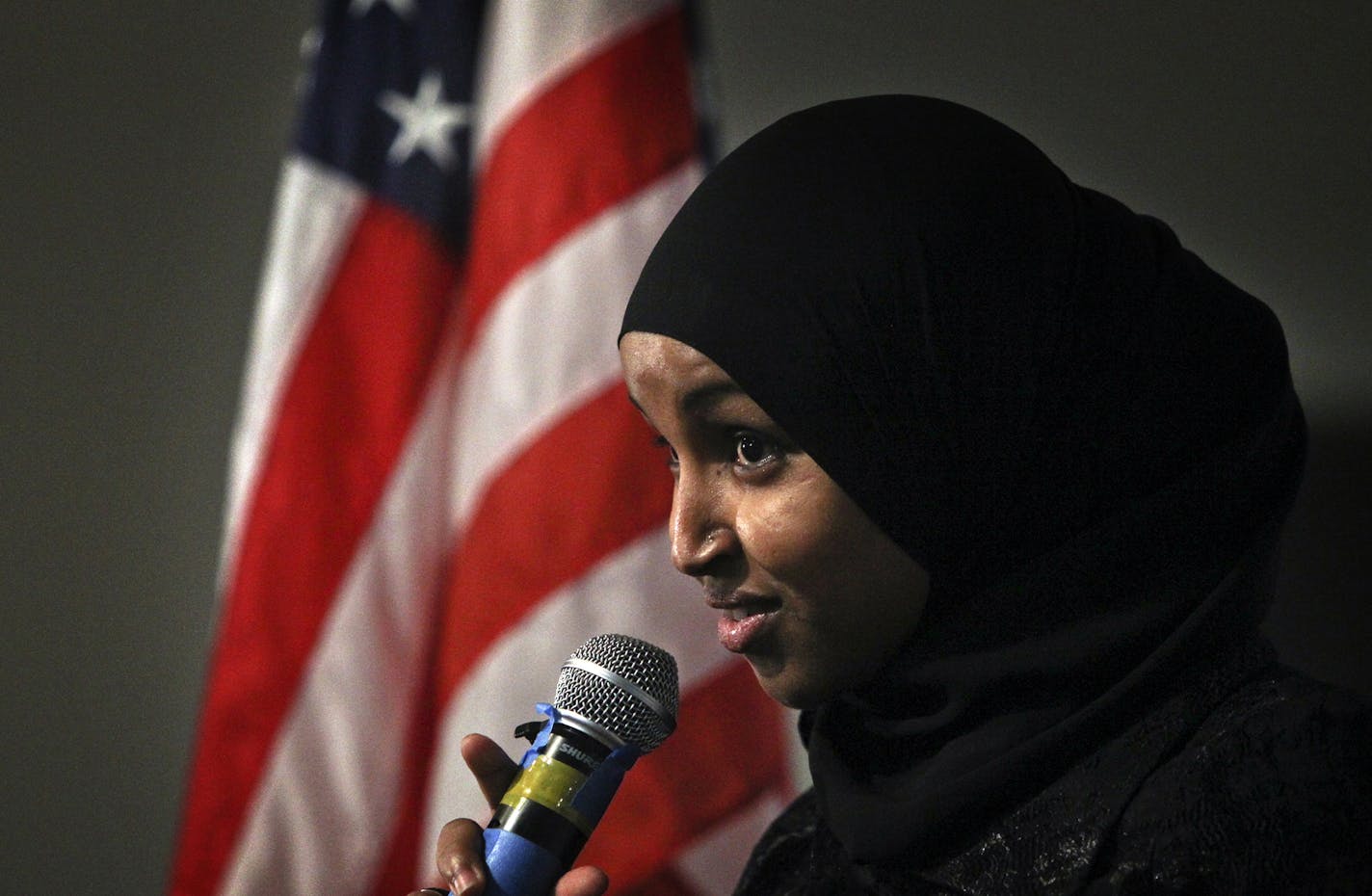 After relative political newcomer Mohamud Noor announced the creation of a Somali PAC called the New Americans Political Action Committe to a gathering at the Safari Restaurant and Banquet Center, Ilhan Omar took the mic to encourage those gathered to become part of the American political processFriday, Aug. 10, 2012, in Minneapolis, MN.] (DAVID JOLES/STARTRIBUNE) Story examines the political awakening of the Somali-American community in Minnesota. More Somalis are getting involved in politics a