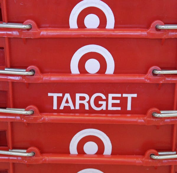 FILE - In this May 20, 2009 file photo, shopping baskets are stacked at a Chicago area Target store. Target Corp. on Tuesday, March 3, 2015 said it pl