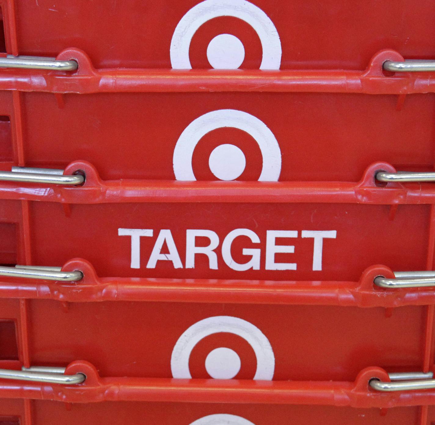 FILE - In this May 20, 2009 file photo, shopping baskets are stacked at a Chicago area Target store. Target Corp. on Tuesday, March 3, 2015 said it plans $2 billion in cost cuts over the next two years through corporate restructuring and other improvements. (AP Photo/Charles Rex Arbogast, File) ORG XMIT: MIN2015031820045771