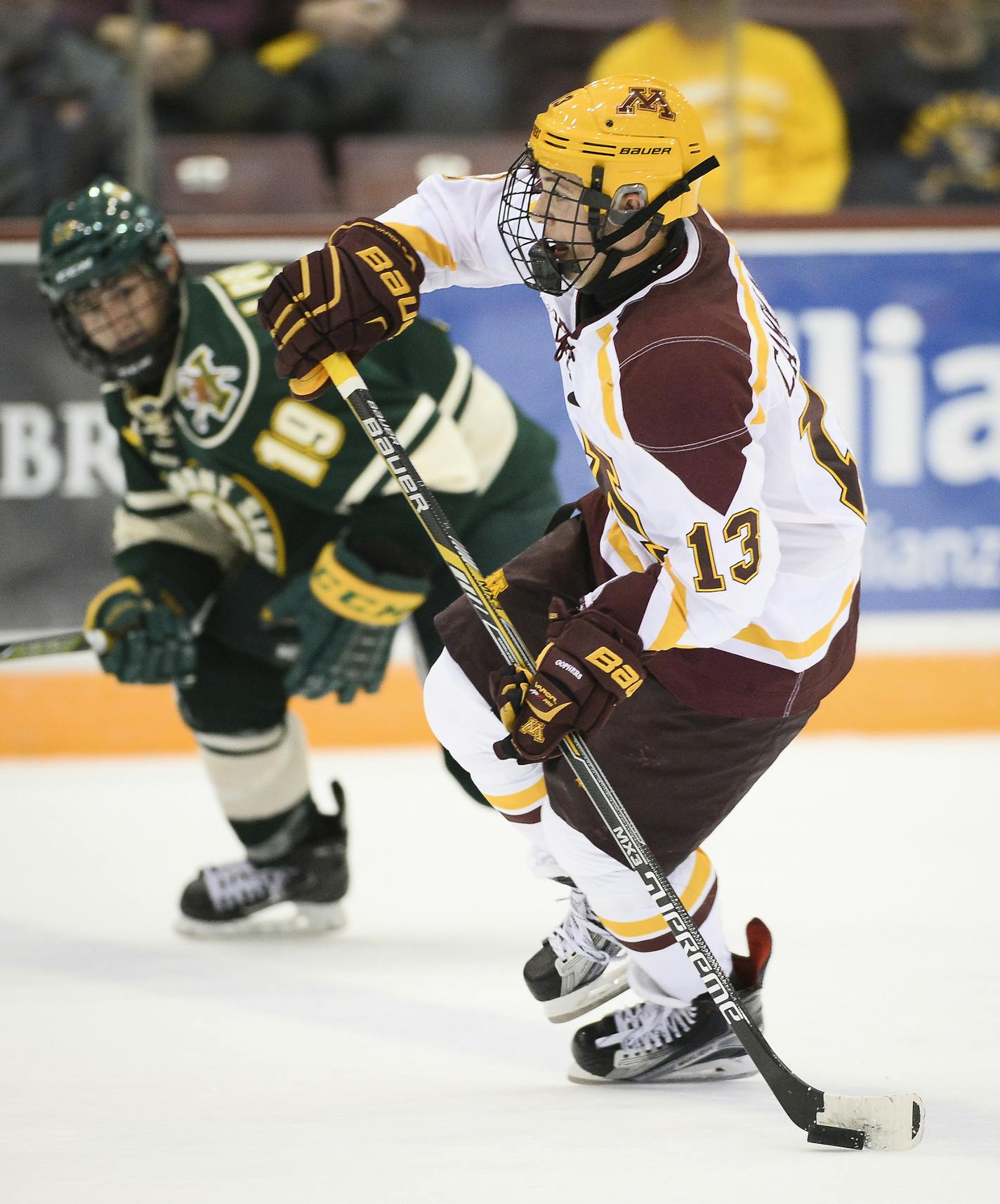 University of Minnesota left wing Taylor Cammarata (13) moved the puck down the ice while being defended by Vermont forward Jarrid Privitera (19) in the second period. ] Aaron Lavinsky &#x2022; aaron.lavinsky@startribune.com The University of Minnesota Golden Gophers men's hockey team played the Vermont Catamounts on Saturday, Oct. 10, 2015 at Mariucci Arena in Minneapolis. ORG XMIT: MIN1510102211530111