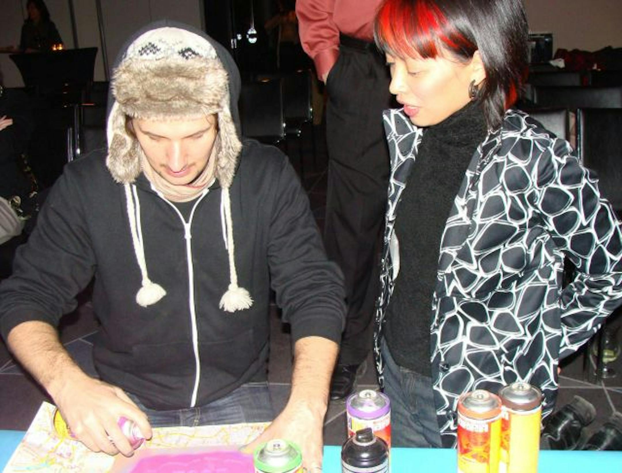 Chase spray-painted "Listen to your soul" on Margarita O'Brien's map of Brussels.