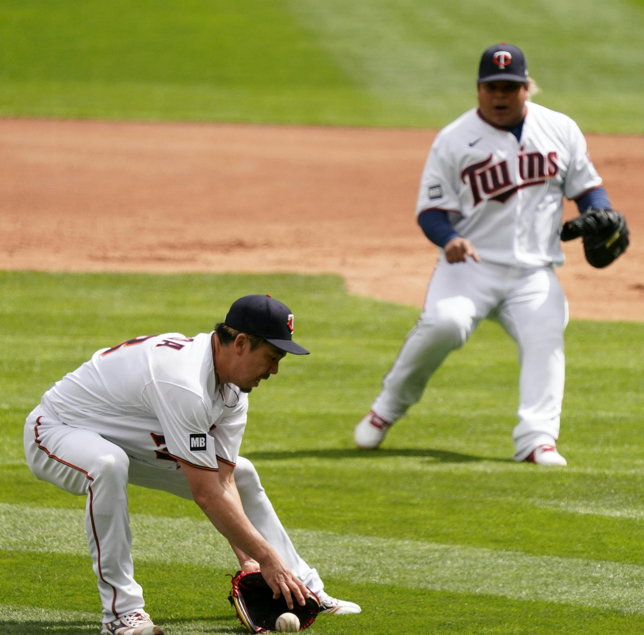 Minnesota Twins starting pitcher Kenta Maeda (18) fielded a bunt by Boston Red Sox catcher Kevin Plawecki (25) in the second inning.