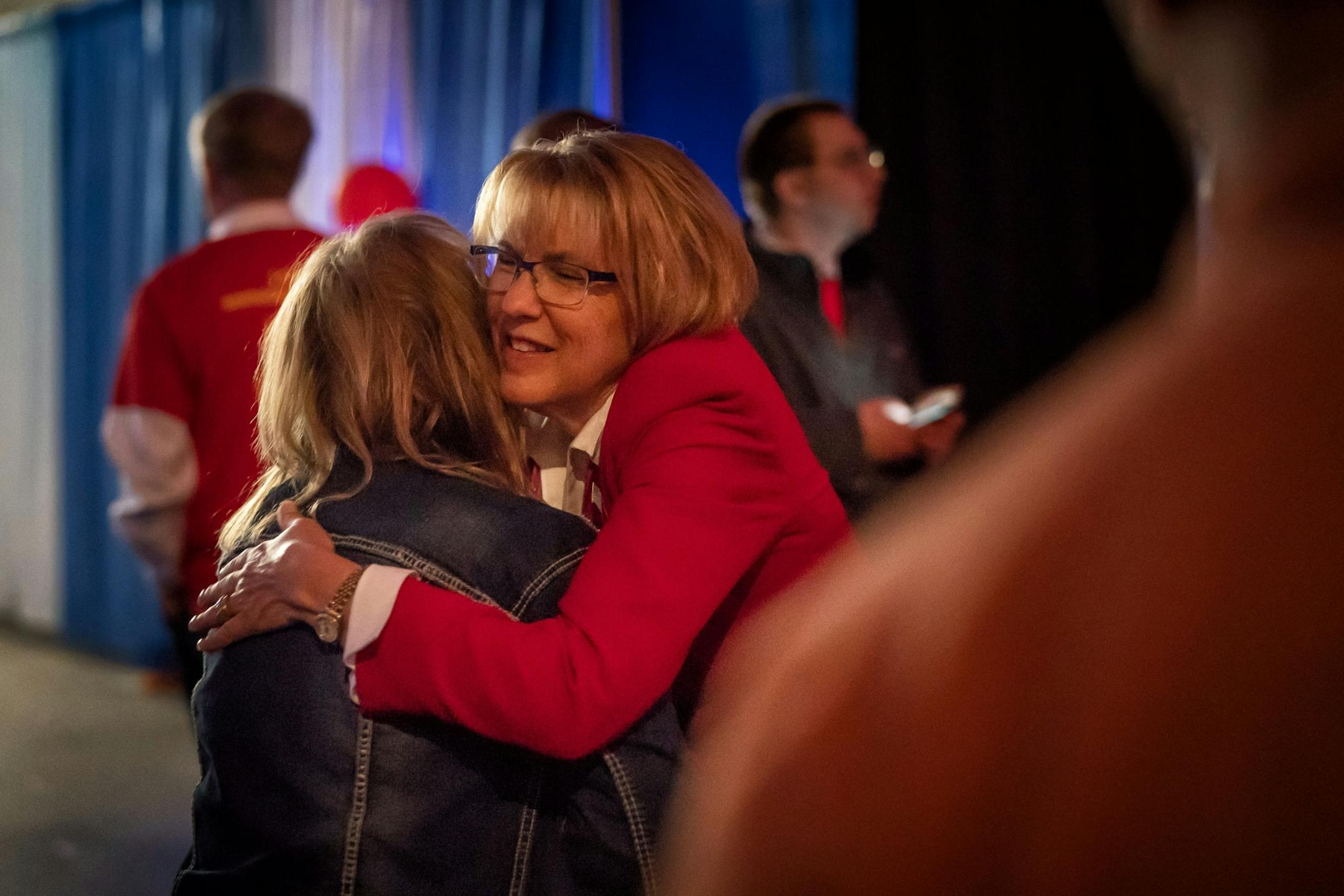 Mary Giuliani Stephens hugged supporters after she withdrew from the race allowing Jeff Johnson to receive the GOP endorsement for Governor.