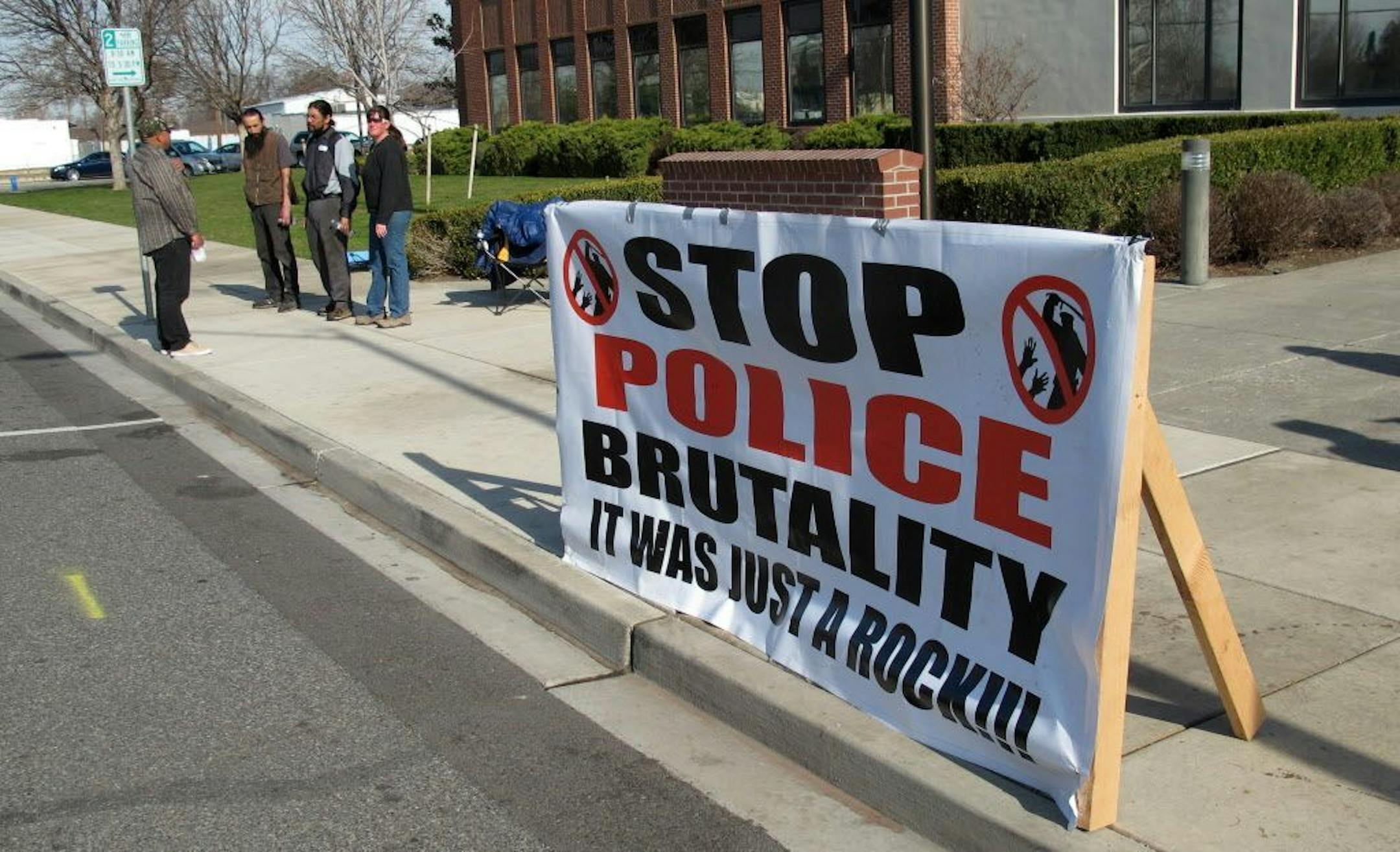 In this Feb. 18, 2015 photo, a protest sign is displayed in front of City Hall in Pasco, Wash.