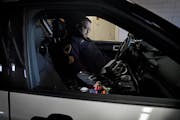 Maplewood Police Sgt. Michael Nye adjusts the trajectory of the Star Chase GPS tech system in one of the department’s squad cars to track stolen car
