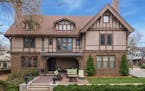 This Tudor-style mansion sits on a corner lot near Lake of the Isles.