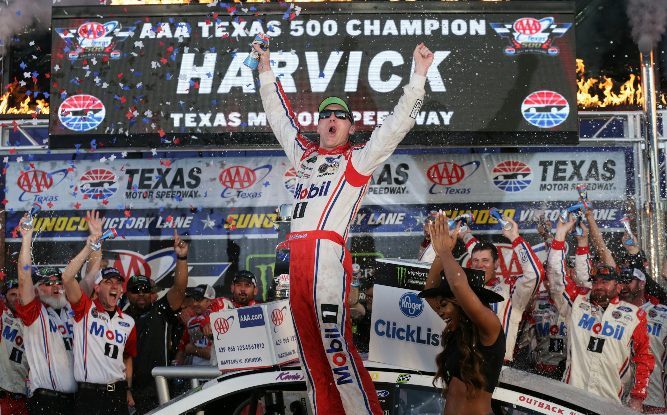 Kevin Harvick celebrated in Victory Lane after winning the NASCAR Cup Series auto race at Texas Motor Speedway in Fort Worth