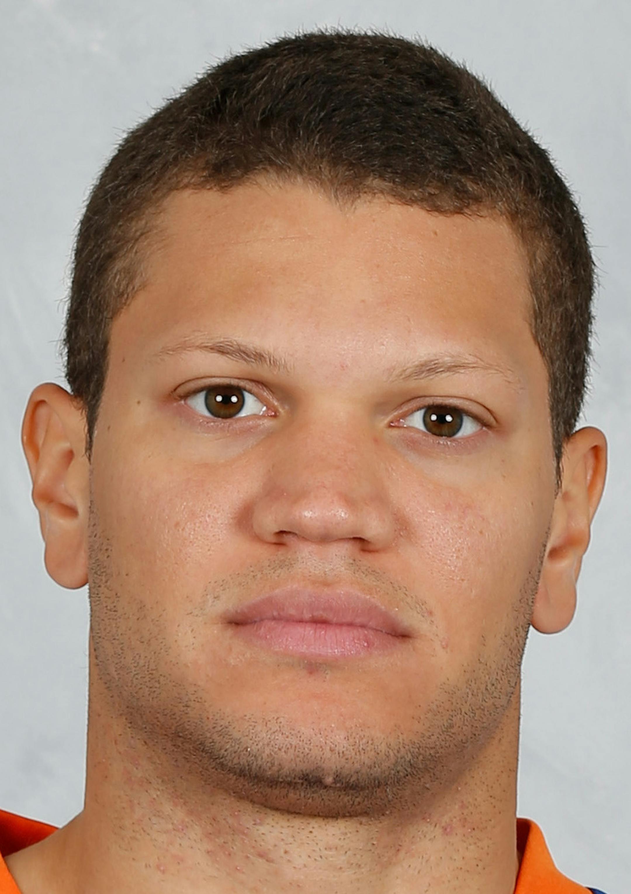 UNIONDALE, NY - SEPTEMBER 18: Kyle Okposo #21 of the New York Islanders poses for his official headshot for the 2014-2015 season on September 18, 2014 at the Nassau Coliseum in Uniondale, New York. (Photo by Mike Stobe/NHLI via Getty Images) *** Local Caption *** Kyle Okposo ORG XMIT: 503032297