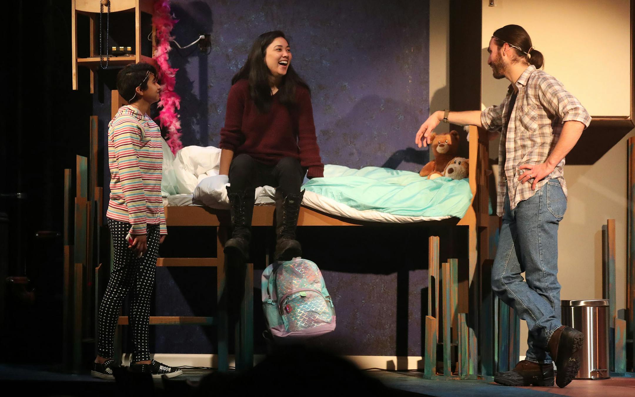 Azoralla Arroyo Caballero as Vi, left, and her father Michael Henna as Bird, listen to director Leah Anderson, center, during a break in rehearsal for "Mermaid Hour: ReMixed, " a musical about a transgender girl Friday, March 30, 2018, at Mixed Blood Theatre Company in Minneapolis, MN.] DAVID JOLES ï david.joles@startribune.com Jacob Frey has proclaimed April 28 Trans Artist Day. Mixed Blood is performing "Mermaid Hour: ReMixed" starting April 6, about a musical about a transgender girl, an