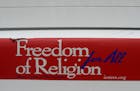 A "Freedom of Religion for All" bumper sticker is displayed on the rear bumper of the car that belongs to the Islamic Center of Murfreesboro Imam Ossa