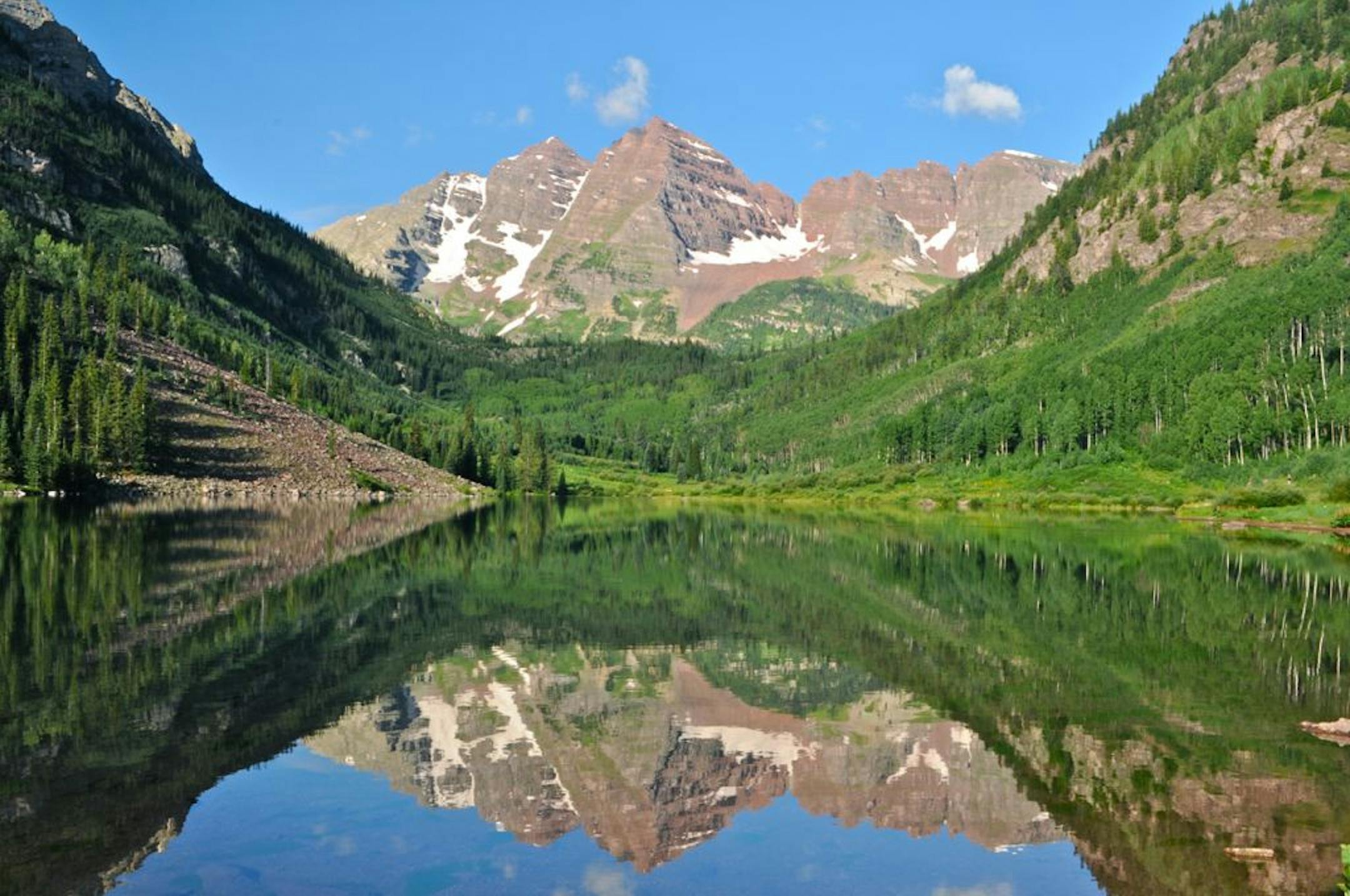 Photographer: Michelle Hoff of Chanhassen. The scene: Hoff has photographed the Maroon Bells near Aspen, Colo., many times since taking her first photo workshop there. This July, she was on a return visit when she shot this photo. "It was mostly cloudy, but the sun came out for a brief moment at sunrise and the stillness gave a beautiful reflection of the mountains and sky," she wrote in an e-mail, adding modestly that "you really can't take a bad picture" because of the beautiful setting.
