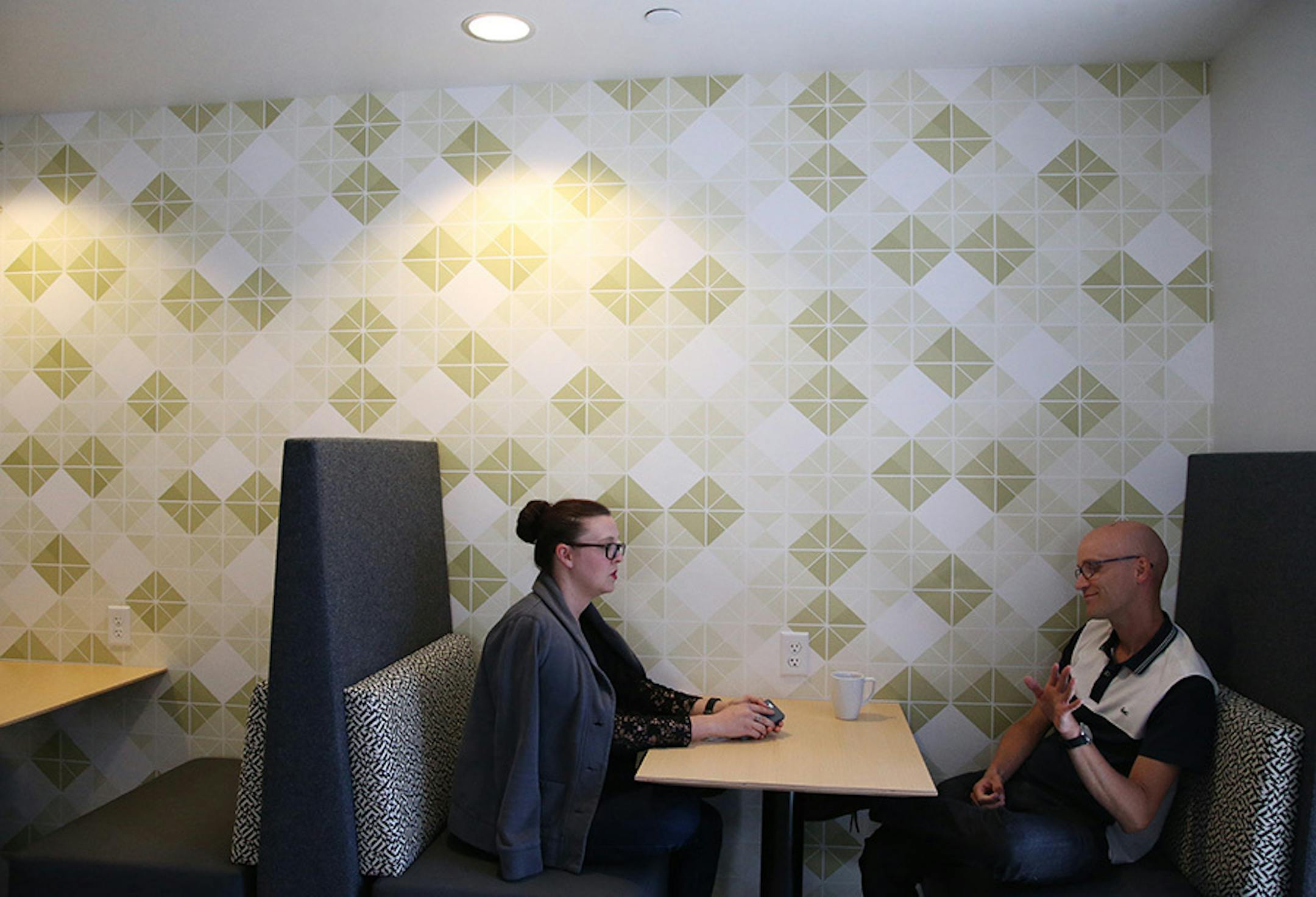 Avery Shnowske, and Nick Halverson chatted with each other in one of the eating areas on the newly redesigned fourth floor.