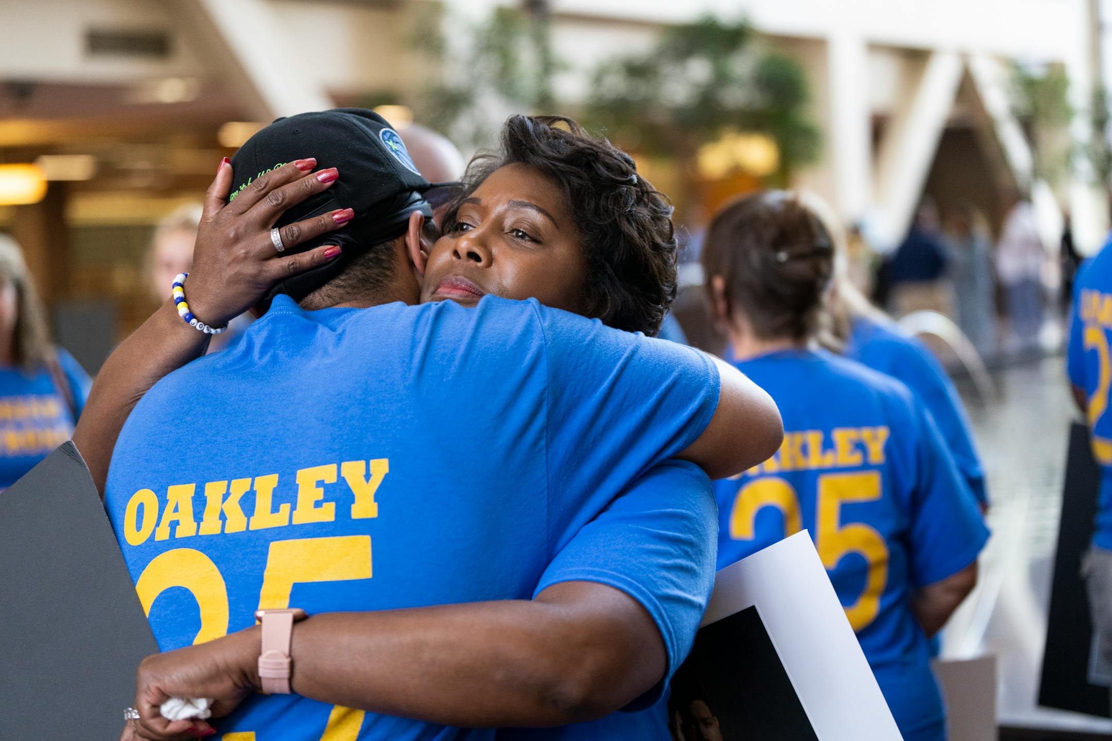 Grandmother of Josiah Oakley Sarah Pryor hugs friends and family after the sentencing for Sylvester Vaughn.