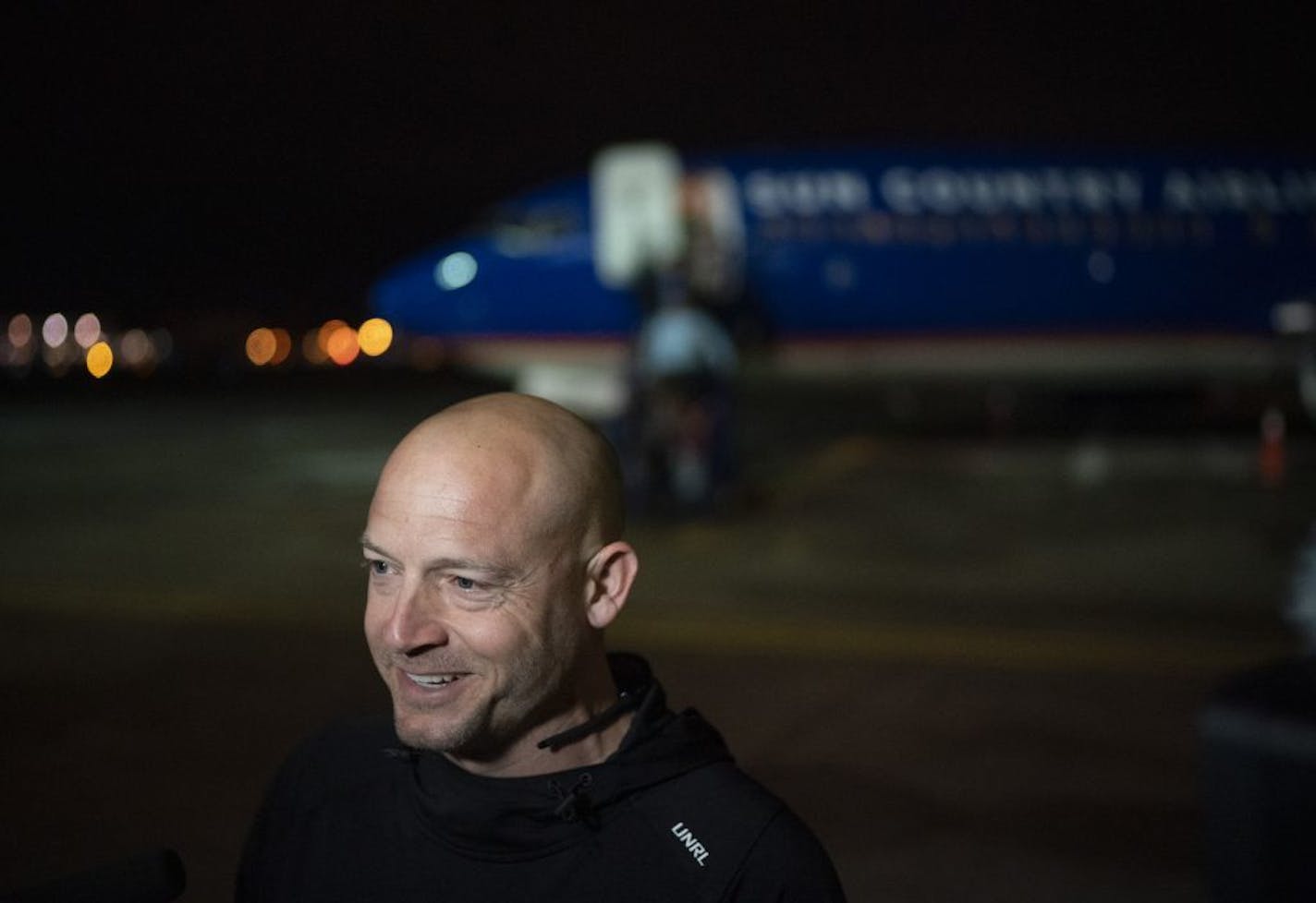 Gophers head coach P.J. Fleck spoke briefly with news media after arriving at Sun Country's hangar with his team Sunday night.