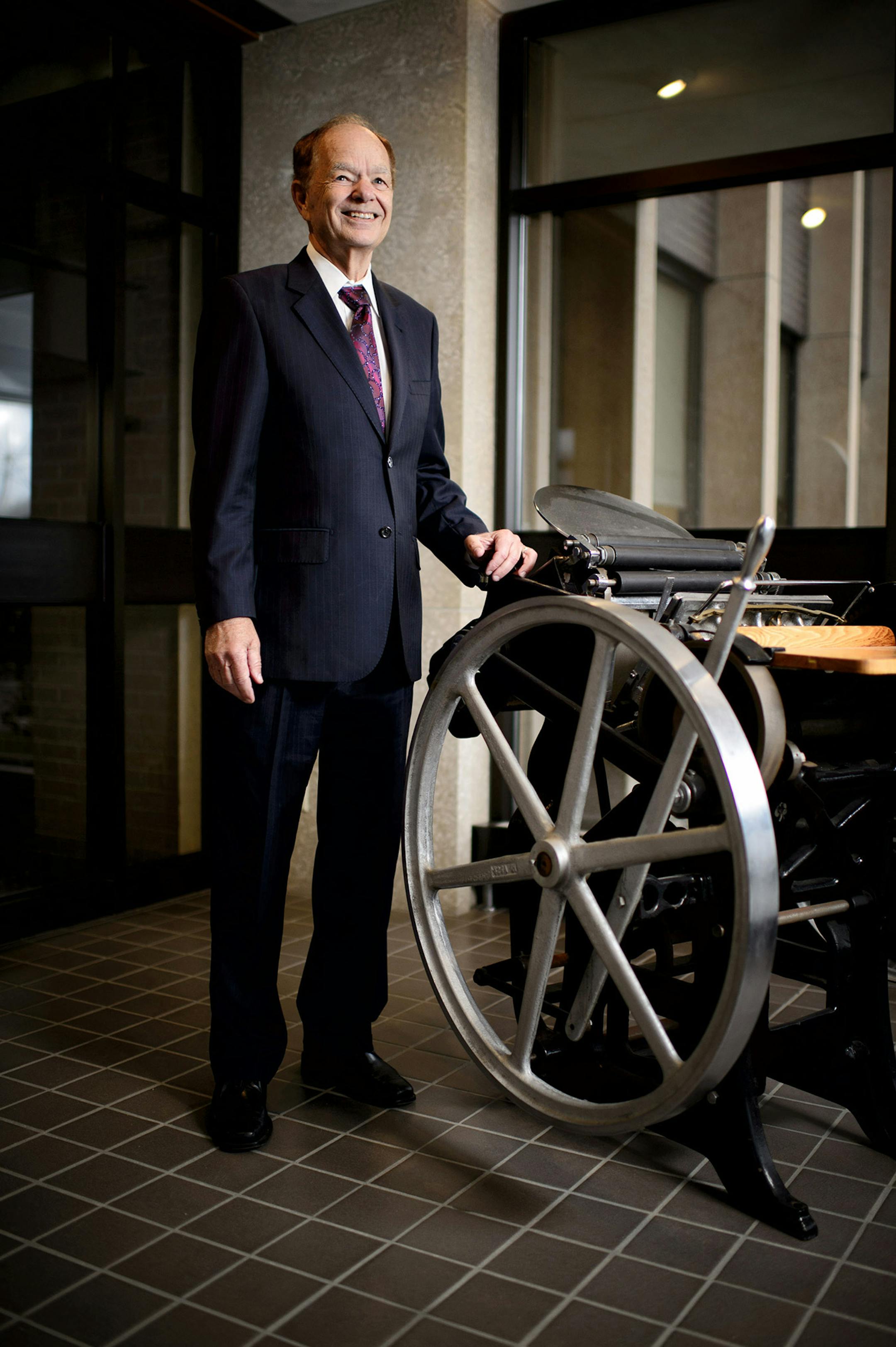 Glen Taylor showed off the printing press he learned to print on in the 1960's. It is now on display in the lobby of his North Mankato office. ] Thursday, April 24, 2014 GLEN STUBBE * gstubbe@startribune.com EDS: FOR USE ONLY WITH CURT BROWN PROFILE, CHECK WITH DEB PASTNER BEFORE USIG FOR ANY OTHER PURPOSE
