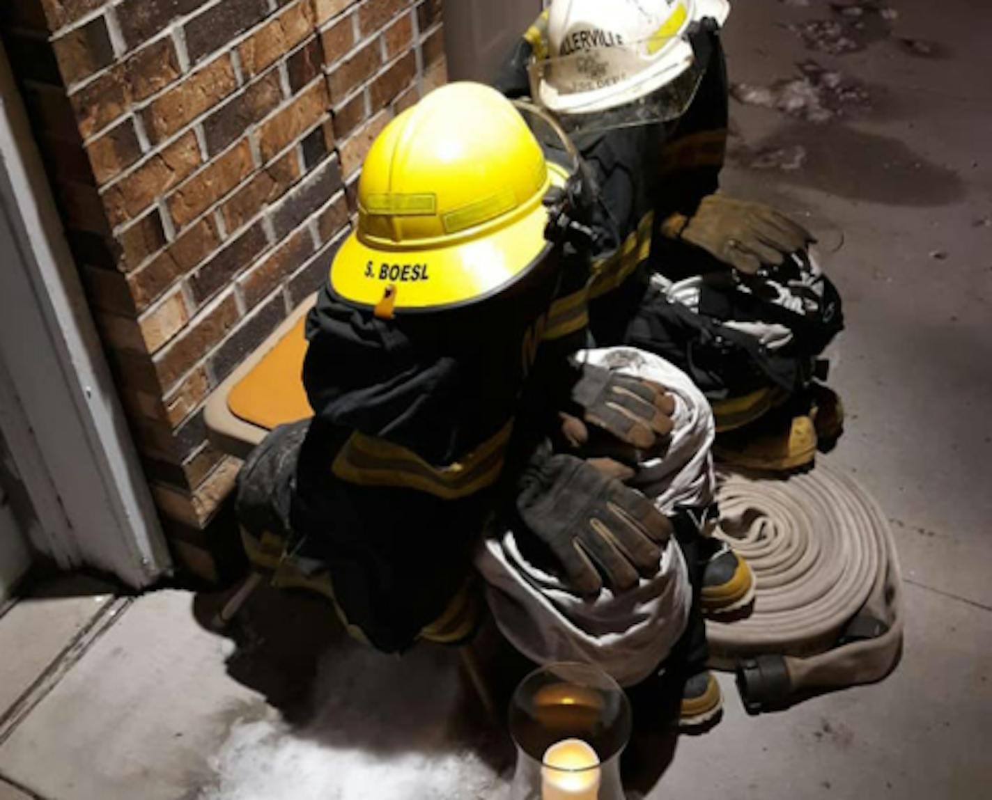 A memorial set up for firefighter Steve Boesl and Assistant Chief Curt Boesl at the Millerville Fire Hall.