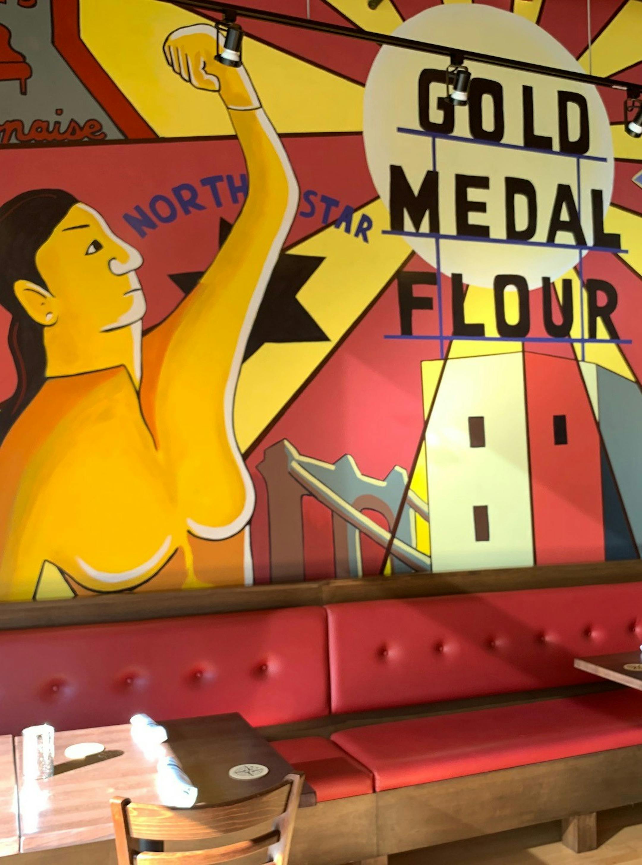 A mural inside Central N.E. reflects the neighborhood's history.